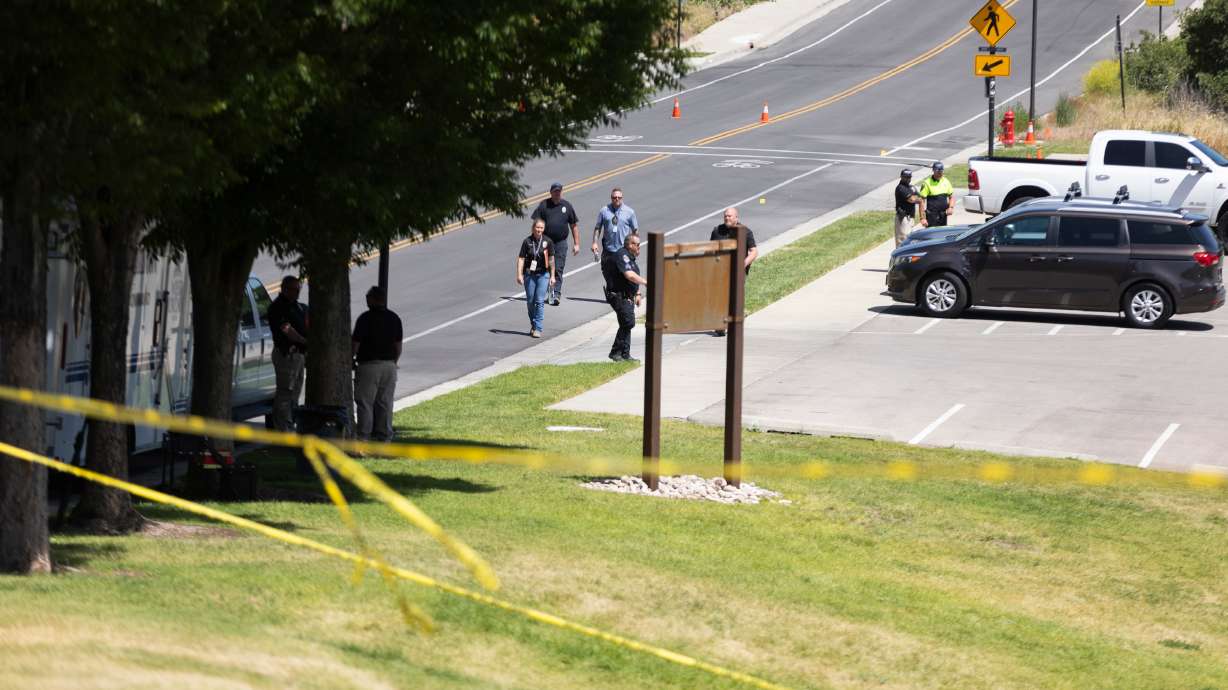 Investigators walk the area where Marcelo Josue Gutierrez, who later died, was shot by police at Skye Park in South Jordan on June 15, 2024. On Thursday, the two police officers who shot Gutierrez were found legally justified in that action.