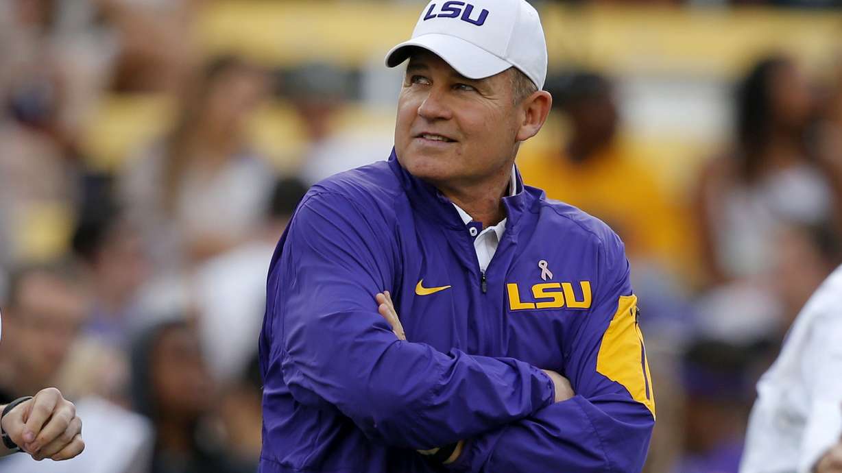 FILE - LSU coach Les Miles watches his team warm up before an NCAA college football game against Florida in Baton Rouge, La., Oct. 17, 2015. Former LSU coach Les Miles is suing the university over its decision to vacate 37 victories between 2012 and 2015. The lawsuit filed Monday, June 17, 2024, in federal court in Baton Rouge alleges that LSU never gave Miles a chance to be heard before altering his career record in a way that disqualified him from being considered for induction into the College Football Hall of Fame.
