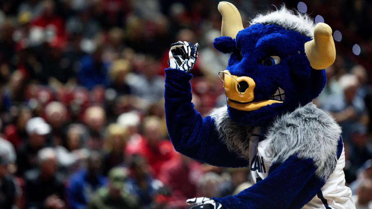 Utah State Aggies mascot Big Blue dances at the Thomas and Mack Center in Las Vegas on March 14. The origin stories of some Utah school mascots might surprise you.
