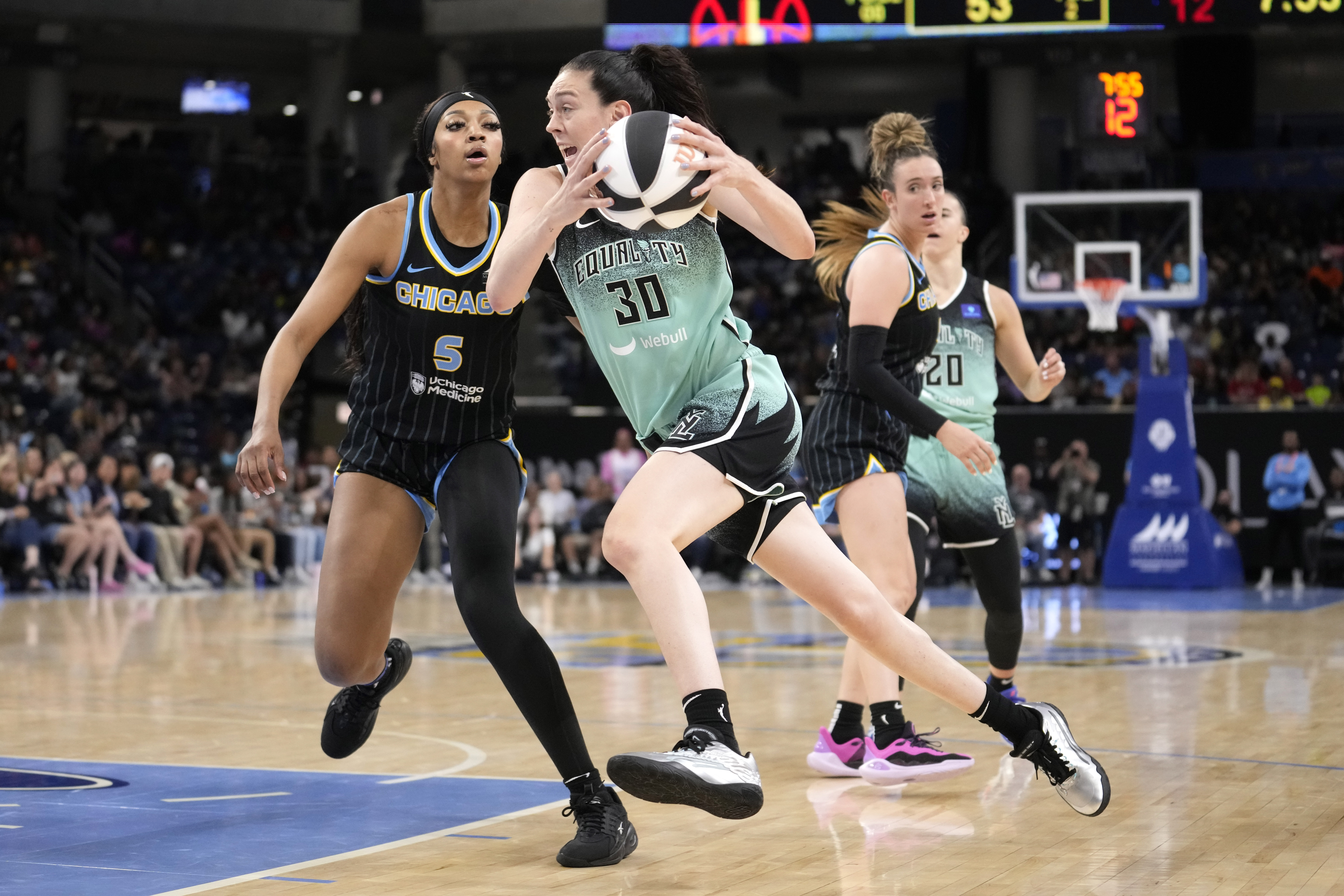 New York Liberty's Breanna Stewart (30) drives to the basket as Chicago Sky's Angel Reese (5) defends during the second half of a WNBA basketball game Tuesday, June 4, 2024, in Chicago. The Liberty won 88-75. 