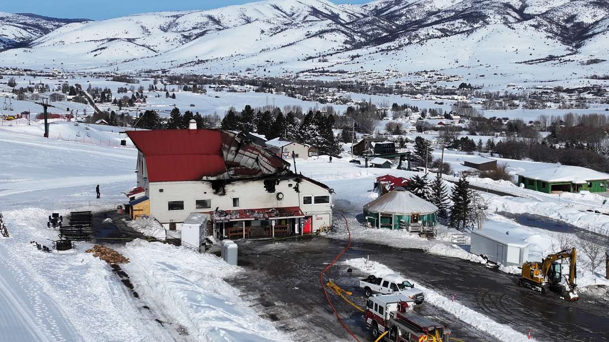 Weber Fire District crews keep watch on the situation after a fire burned the lodge at Nordic Valley ski resort in Eden, Weber County, on Jan. 15. Nordic Valley ski resort officials said Monday they won't rebuild the lodge until 2026 or 2027 and are focused, for now, on fixing the Apollo lift.