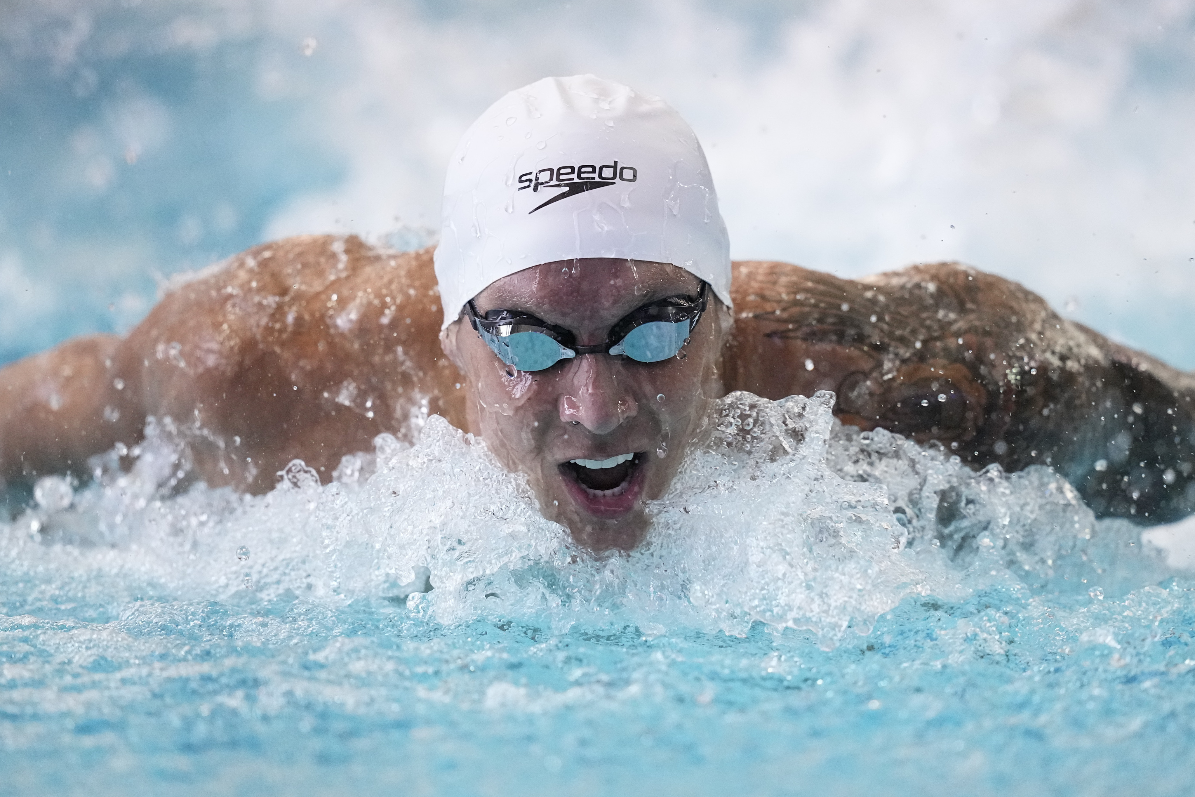 FILE - Caeleb Dressel swims the men's 100 butterfly during the Speedo Atlanta Classic finals Friday, May 12, 2023, in Atlanta. 