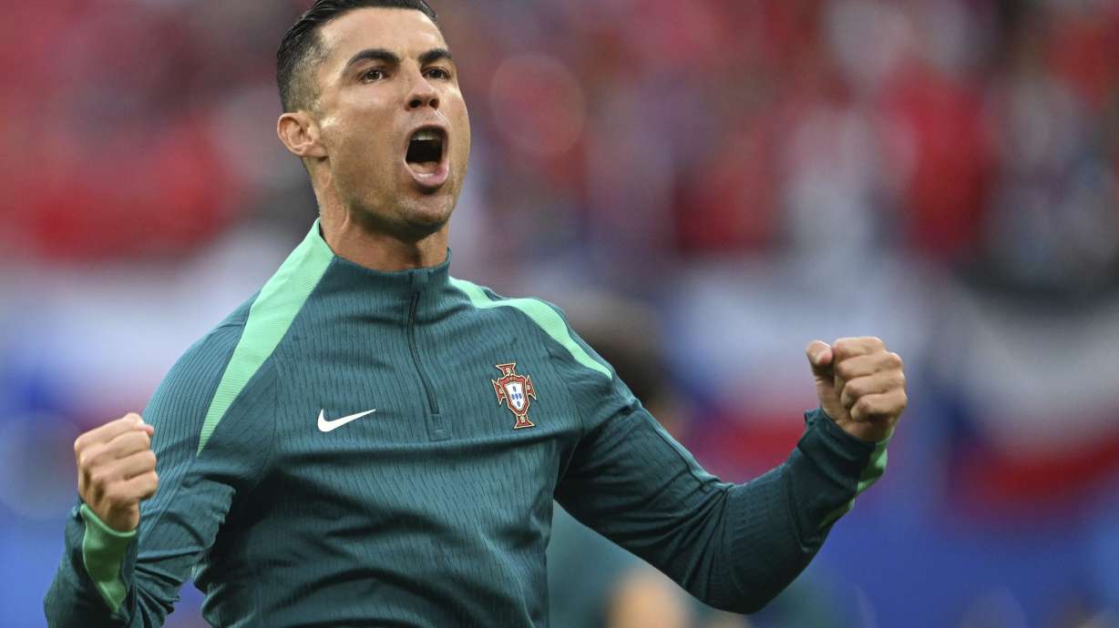 Portugal's Cristiano Ronaldo shouts during the warm up prior for a Group F match between Portugal and Czech Republic at the Euro 2024 soccer tournament in Leipzig, Germany, Tuesday, June 18, 2024.