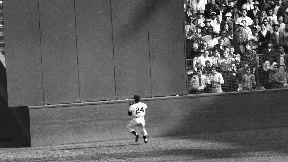 FILE - New York Giants' Willie Mays makes a catch of a ball hit by Cleveland Indians' Vic Wertz in Game 1 of the 1954 baseball World Series in New York's Polo Grounds on Sept. 29, 1954. Mays, the electrifying “Say Hey Kid” whose singular combination of talent, drive and exuberance made him one of baseball’s greatest and most beloved players, has died. He was 93. Mays' family and the San Francisco Giants jointly announced Tuesday night, June 18, 2024, he had “passed away peacefully” Tuesday afternoon surrounded by loved ones.