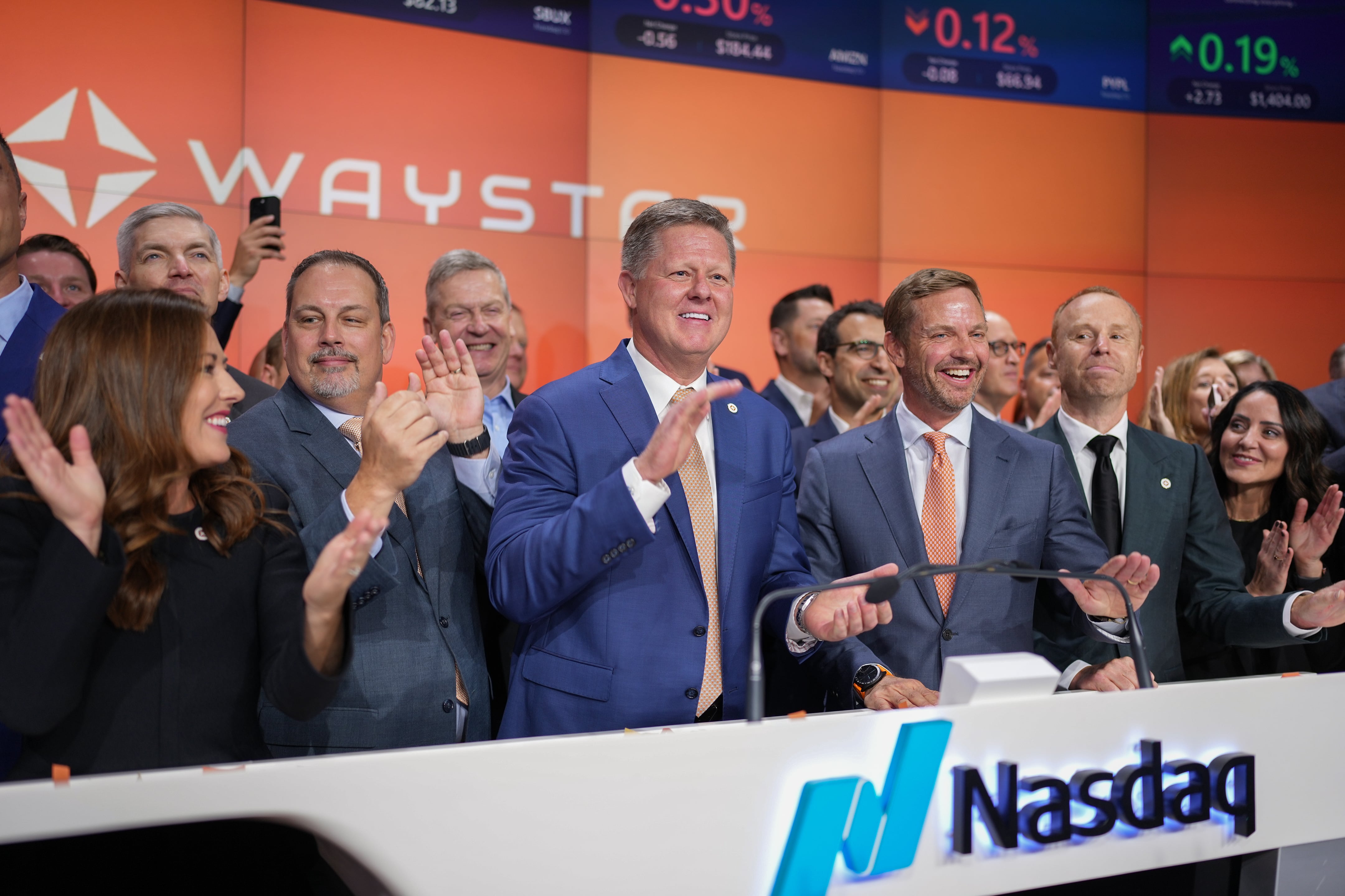 Waystar CEO Matthew Hawkins, center, gathers with employees on June 6 at the NASDAQ exchange in New York City. The company was there to mark its initial public stock offering, which raised nearly $1 billion for the health care payment software innovator based in Lehi.