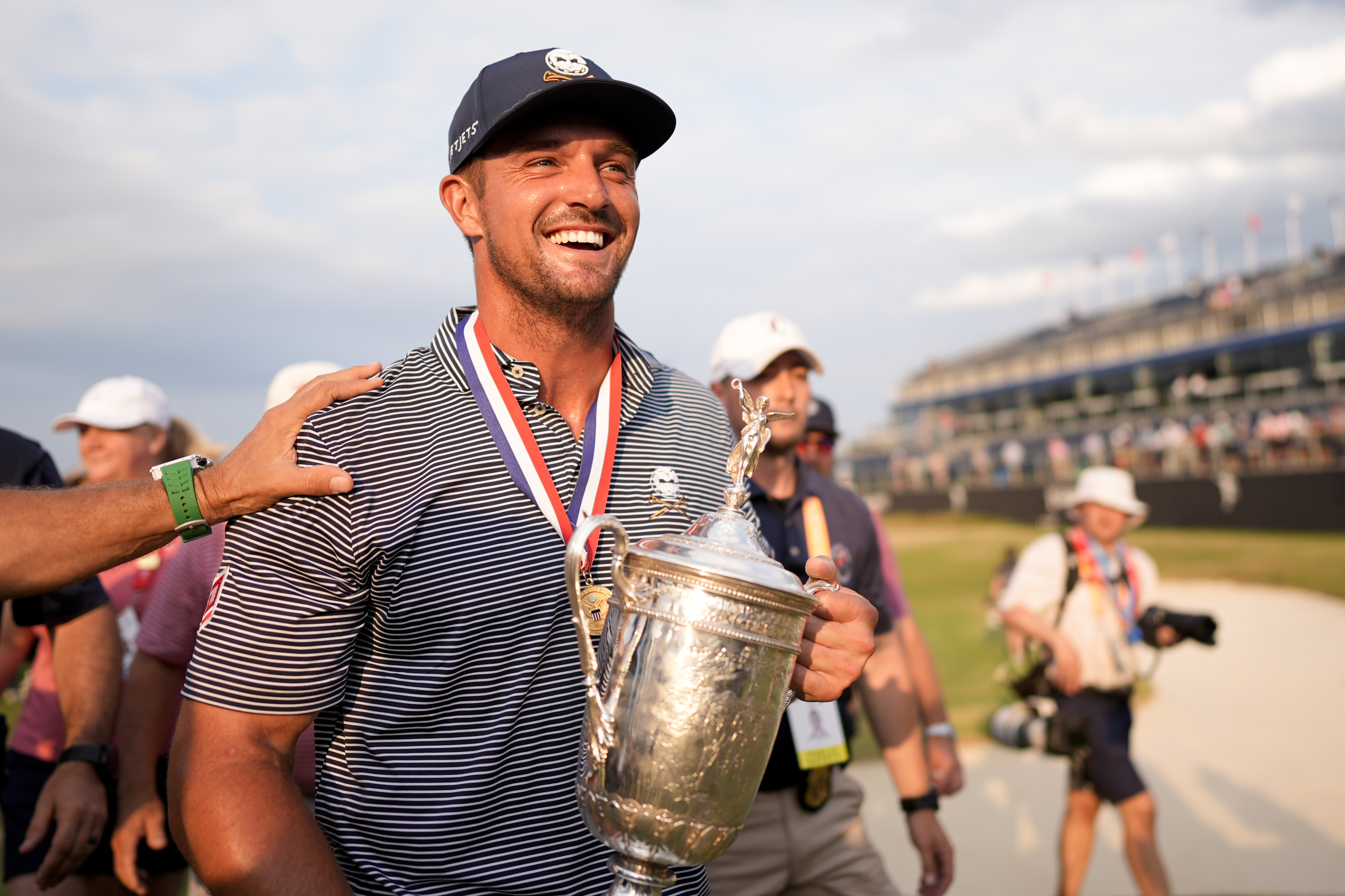 Bryson DeChambeau holds the trophy after winning the U.S. Open golf tournament Sunday, June 16, 2024, in Pinehurst, N.C. 