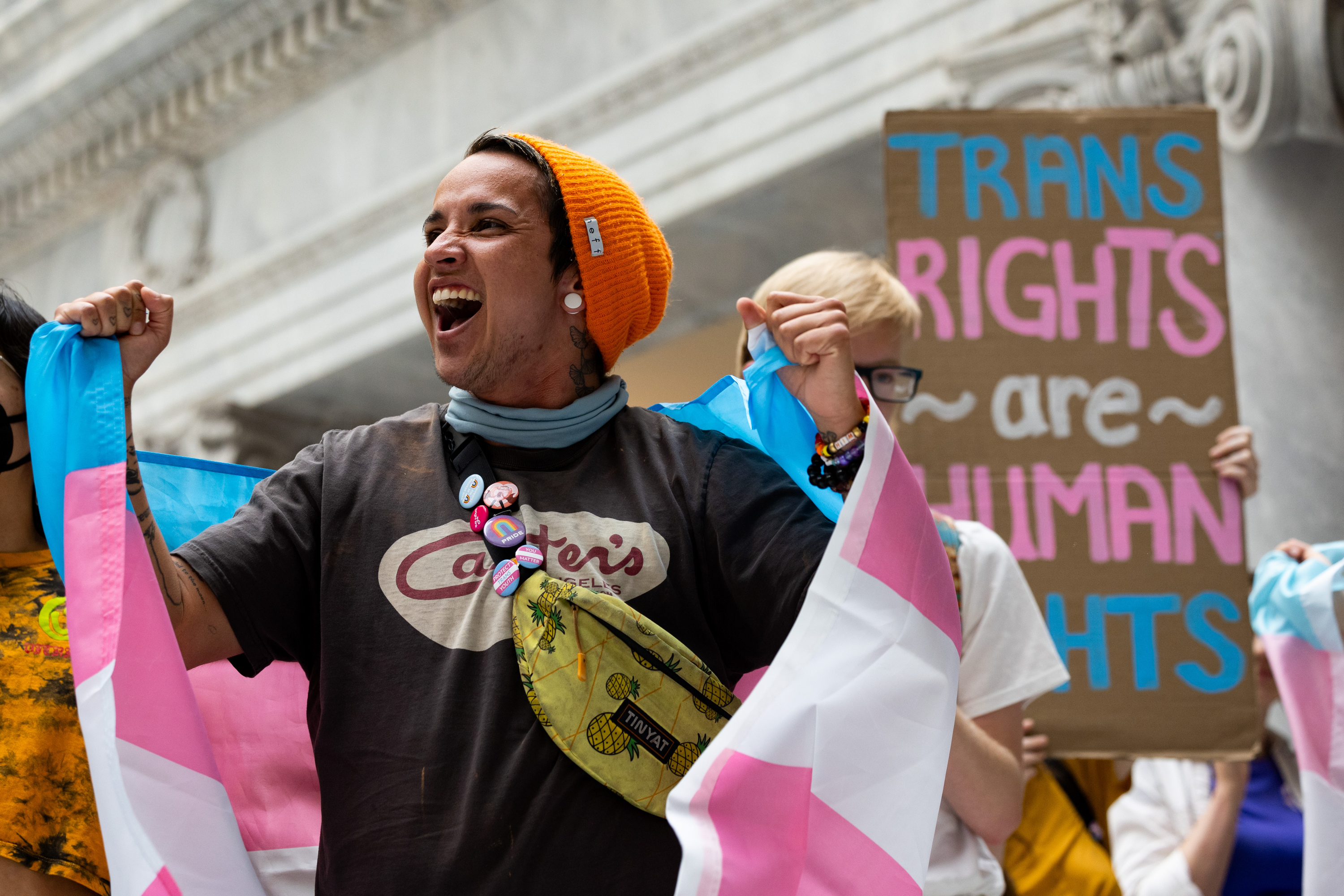 Jonas Everts cheers as protestors gather outside the house chambers during a legislative special session at the Utah Capitol in Salt Lake City on Wednesday.