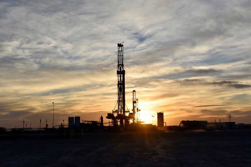 Drilling rigs operate at sunset in Midland, Texas, Feb. 13, 2019. Global fossil fuel consumption and energy emissions hit all-time highs in 2023, even as fossil fuels' share of the global energy mix decreased slightly on the year.