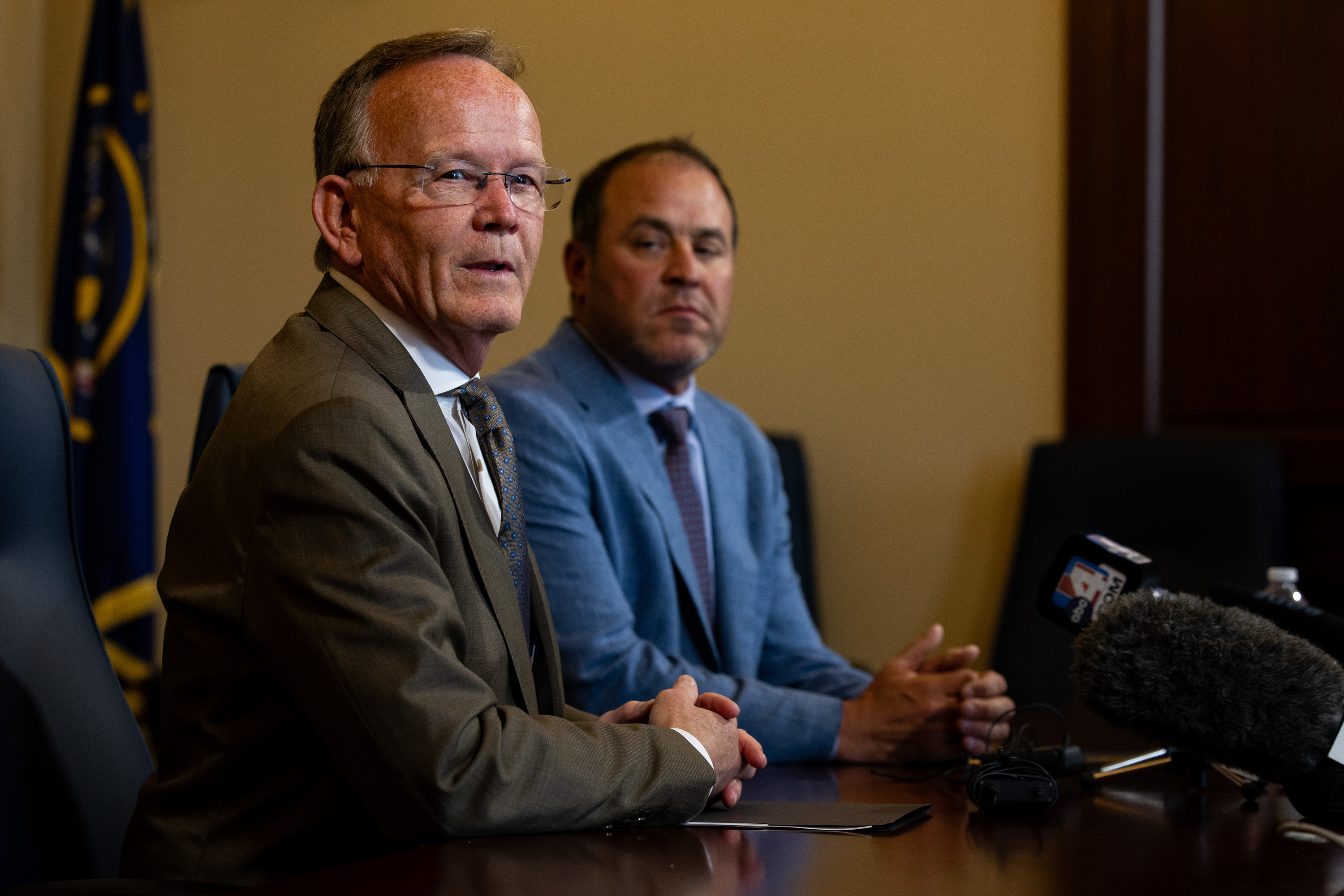 Senate President Stuart Adams, left, and Utah House Speaker Mike Schultz speak at the state Capitol June 19, 2024. Schultz plans to convene a That'group to review state policy after Adams has been accused of inspiring a new law that helped his granddaughter reach a plea bargain.