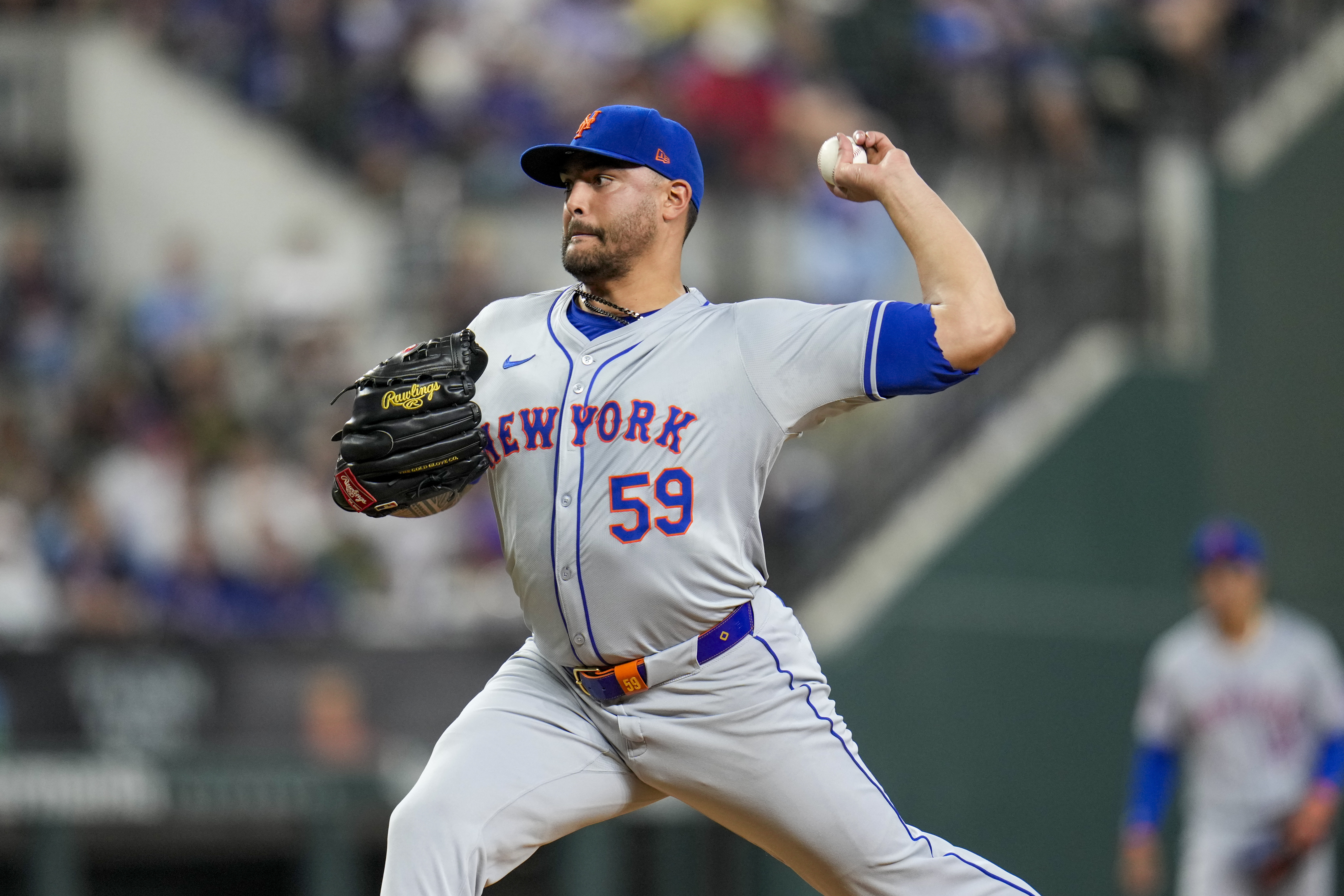 New York Mets pitcher Sean Manaea throws a pitch to the Texas Rangers during the second inning of a baseball game, Wednesday, June 19, 2024, in Arlington, Texas. 
