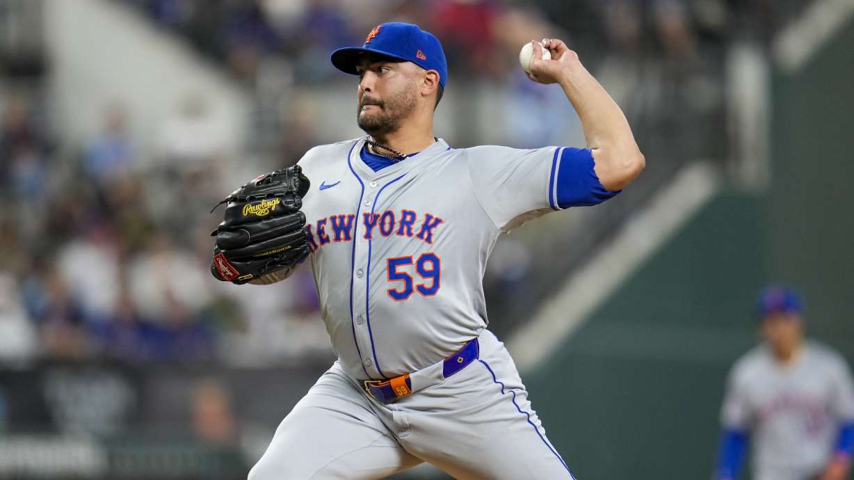 New York Mets pitcher Sean Manaea throws a pitch to the Texas Rangers during the second inning of a baseball game, Wednesday, June 19, 2024, in Arlington, Texas.