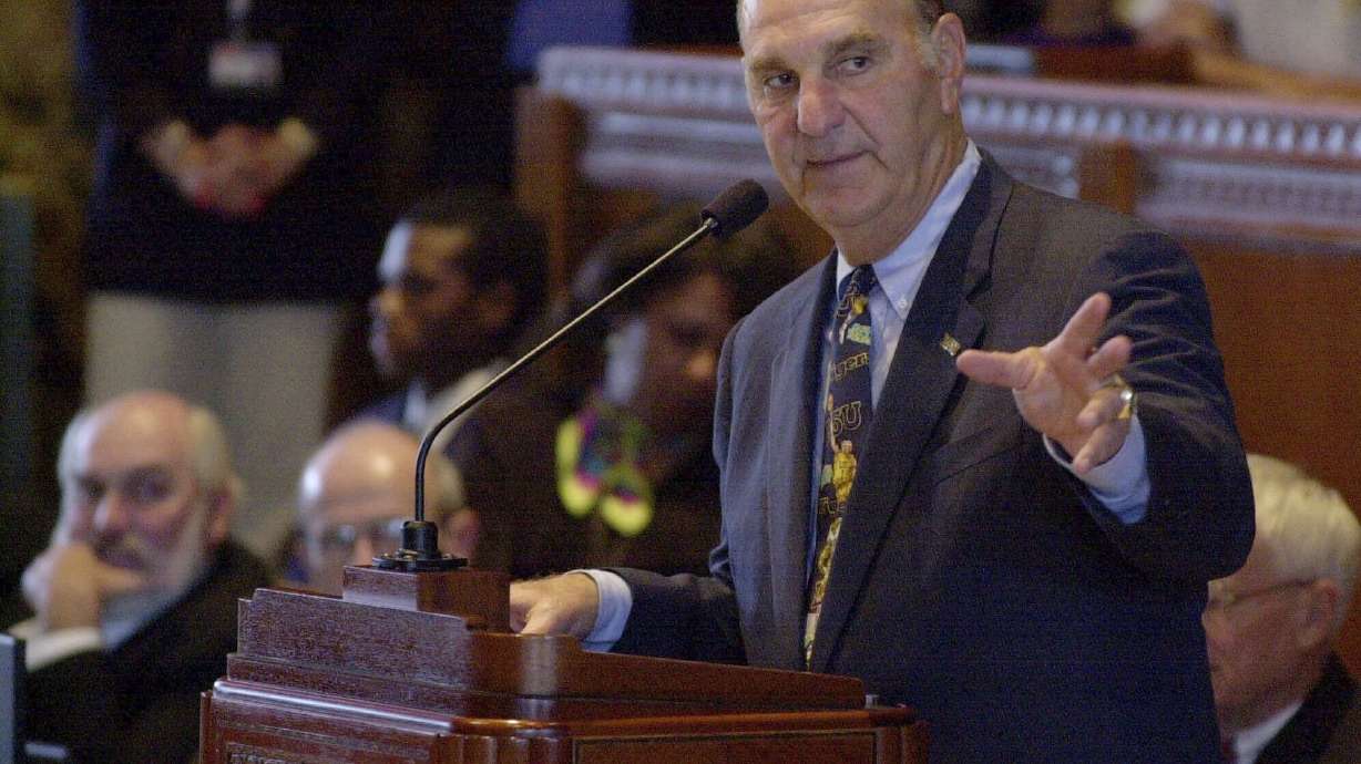 FILE - Louisiana State baseball coach Skip Bertman addresses the state House of Representatives at the Capitol in Baton Rogue, La., June 21, 2000. Bertman's 1997 Tigers slugged 188 home runs in 70 games on their way to the second of two straight national championships and were the inspiration for the phrase "gorilla ball,” the descriptor for the style of offense in an era when bats were juiced and balls flew out of ballparks at unprecedented rates.