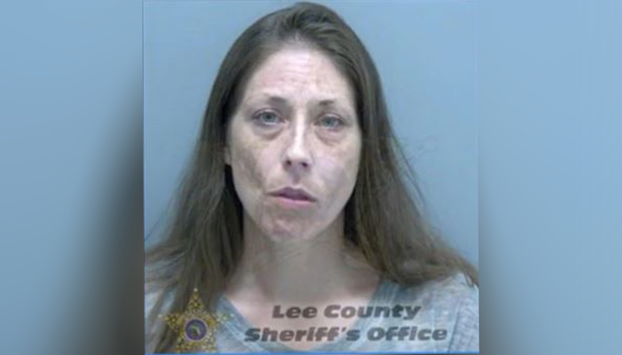 Christy Turman was arrested after reportedly calling 911 to report she was stealing a car from a dealership — so she "could do it legally."