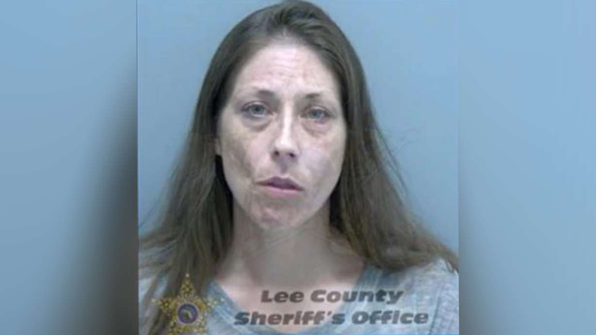 Christy Turman was arrested after reportedly calling 911 to report she was stealing a car from a dealership — so she "could do it legally."