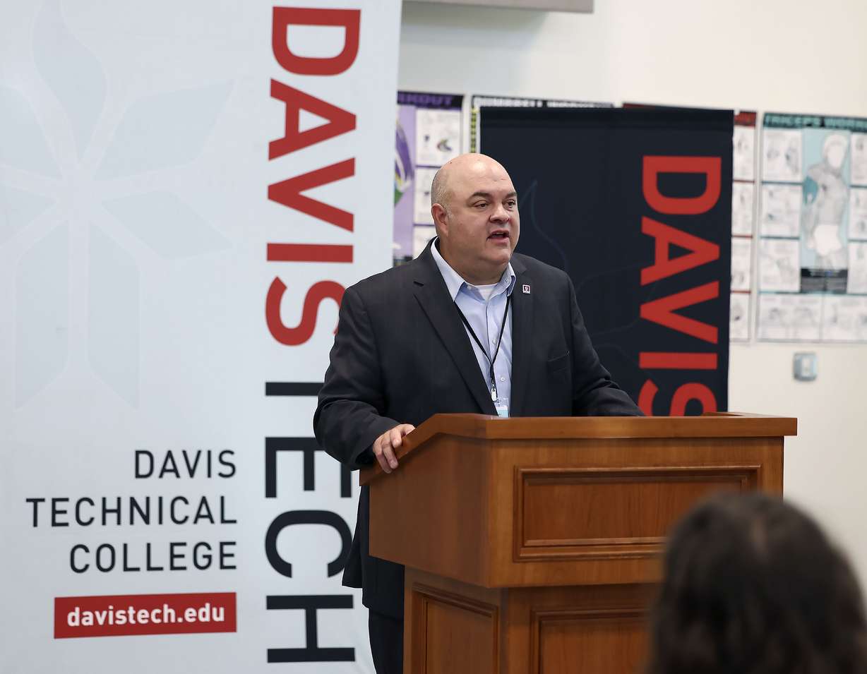 Darin Brush, president of Davis Technical College, speaks at a press conference on Aug. 25, 2023. Brush defended the school's nail technician program on Wednesday to the Utah Board of Higher Education.