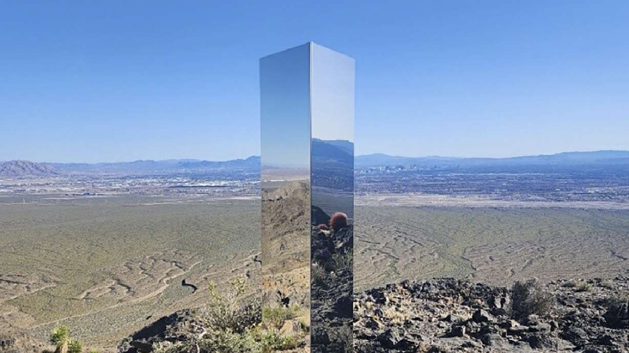 A monolith is seen near Gass Peak, Nev., on Sunday. The structure, jutting out of the rocks on a remote mountain peak near Las Vegas, has been removed.