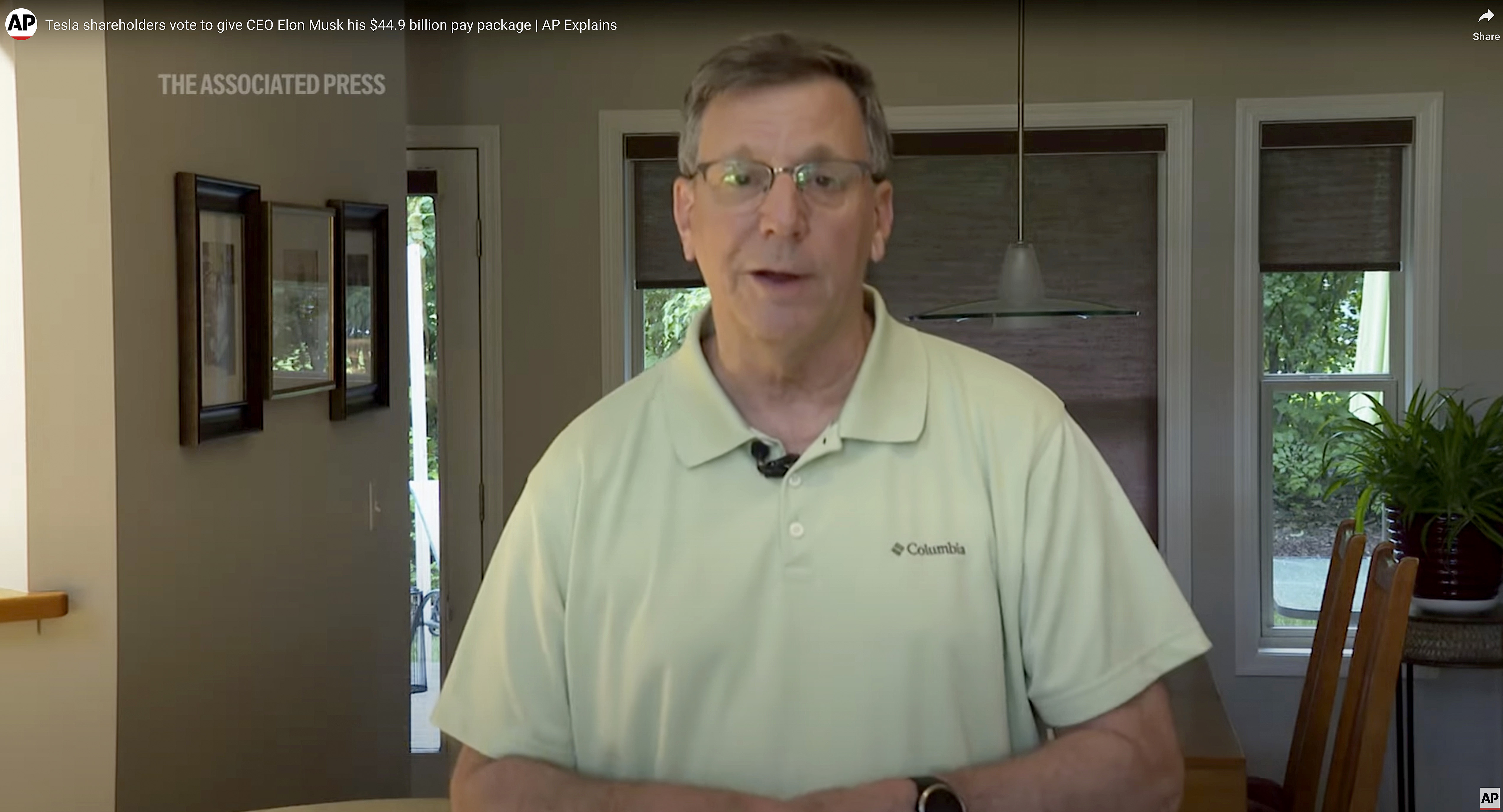 In this image taken from video, AP reporter Tom Krisher discusses a Tesla shareholder vote to restore CEO Elon Musk's $44.9 billion pay package, June 13, 2024. Manipulated video from the report circulated on the eve of the match between Slovakia and Ukraine at this year's European Championship, with the false claim that Slovak flags had been banned from all games because of their similarity to the Russian flag. No such video exists and the AP has not reported that there is a ban of Slovak flags at the soccer tournament. 