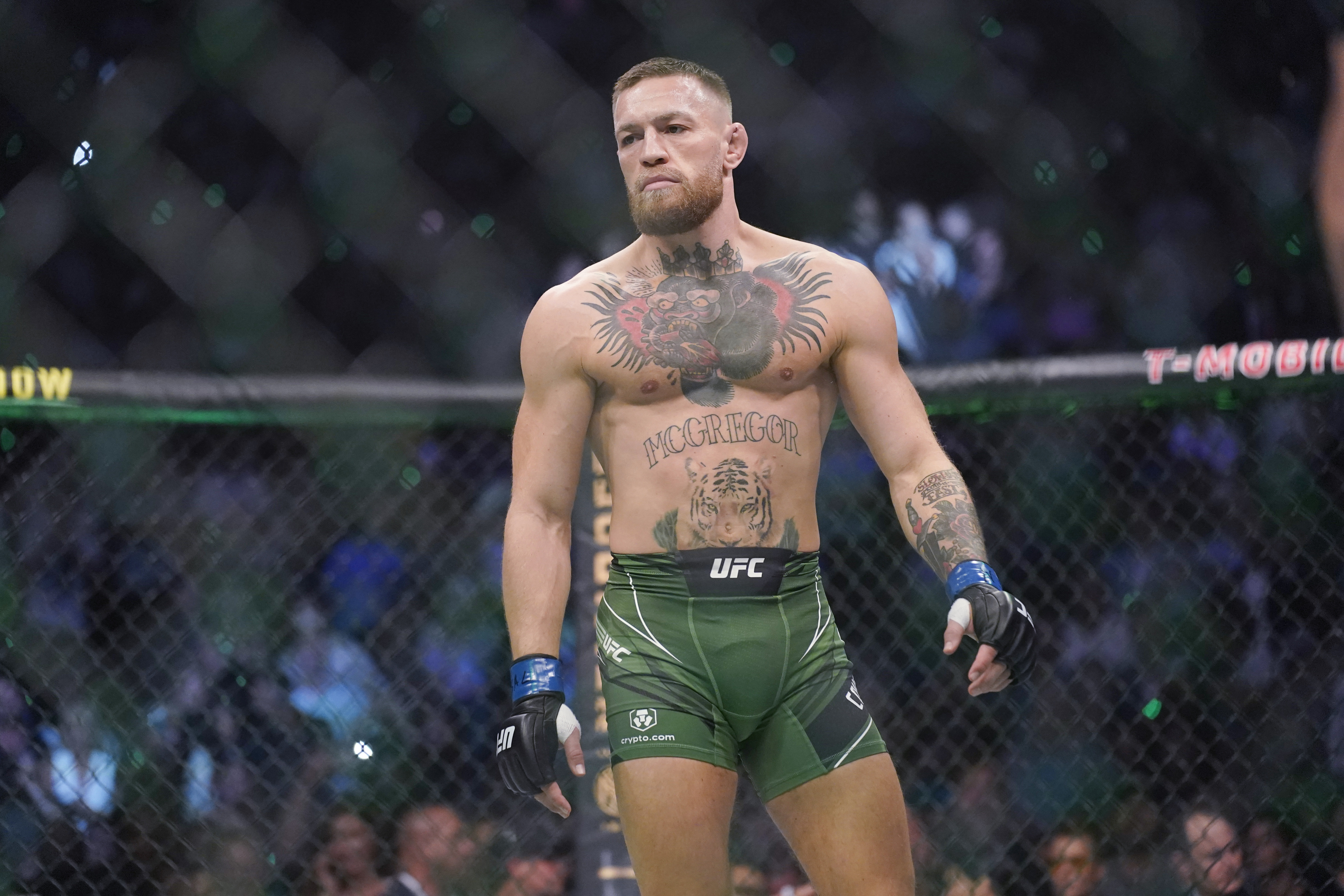 FILE - Conor McGregor prepares to fight Dustin Poirier in a UFC 264 lightweight mixed martial arts bout July 10, 2021, in Las Vegas. McGregor will not compete in UFC 303 on Saturday, June 29, 2024, in Las Vegas. He has indicated he is injured.