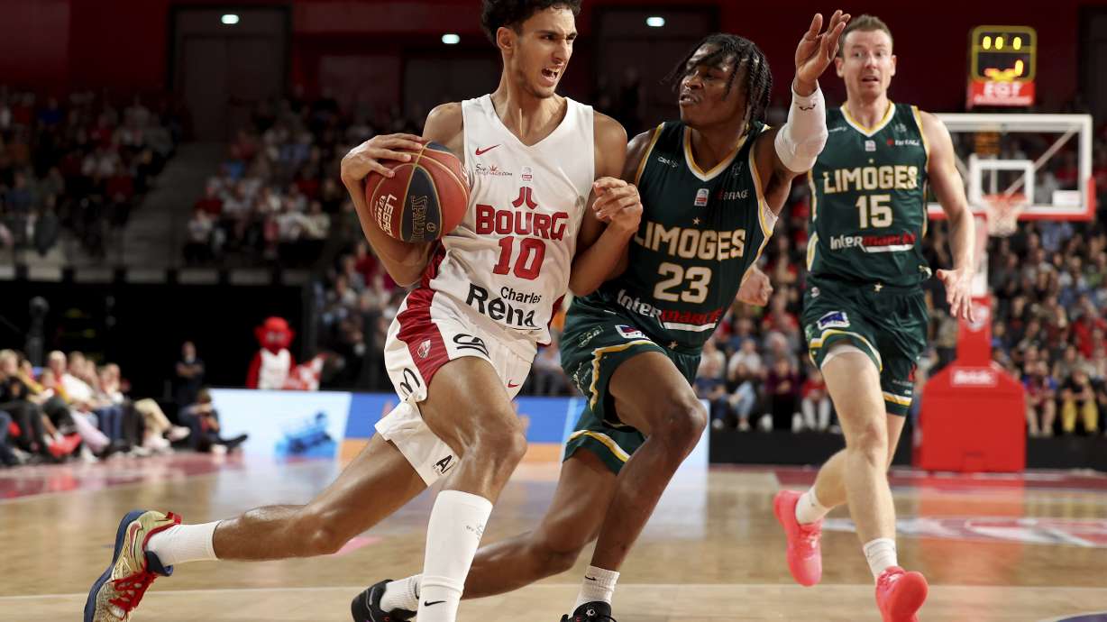 FILE - Zaccharie Risacher, of Bourg-en-Bresse, dribbles during a Betclic Elite basketball game against Limoges in Bourg-en-Bresse, eastern France, Oct. 31, 2023. Risacher is among the headliners of the forwards in the upcoming NBA draft.
