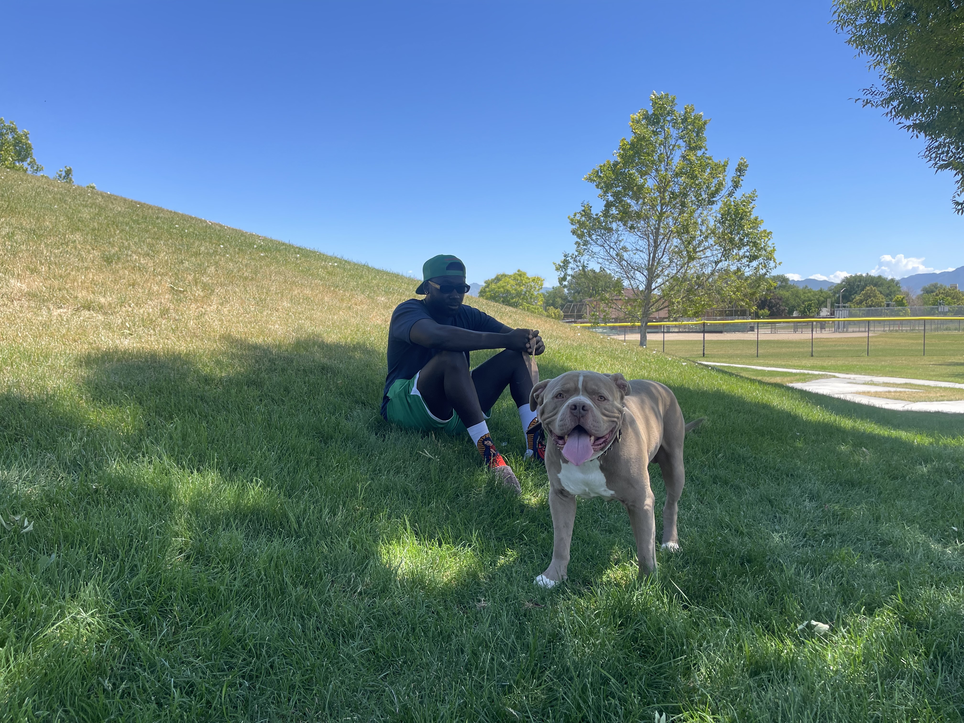 Husaya Hama poses with his dog, Zombie. West Valley City Animal Services held a Shelter Saturday event, where people could come to adopt pets in need of a good home.