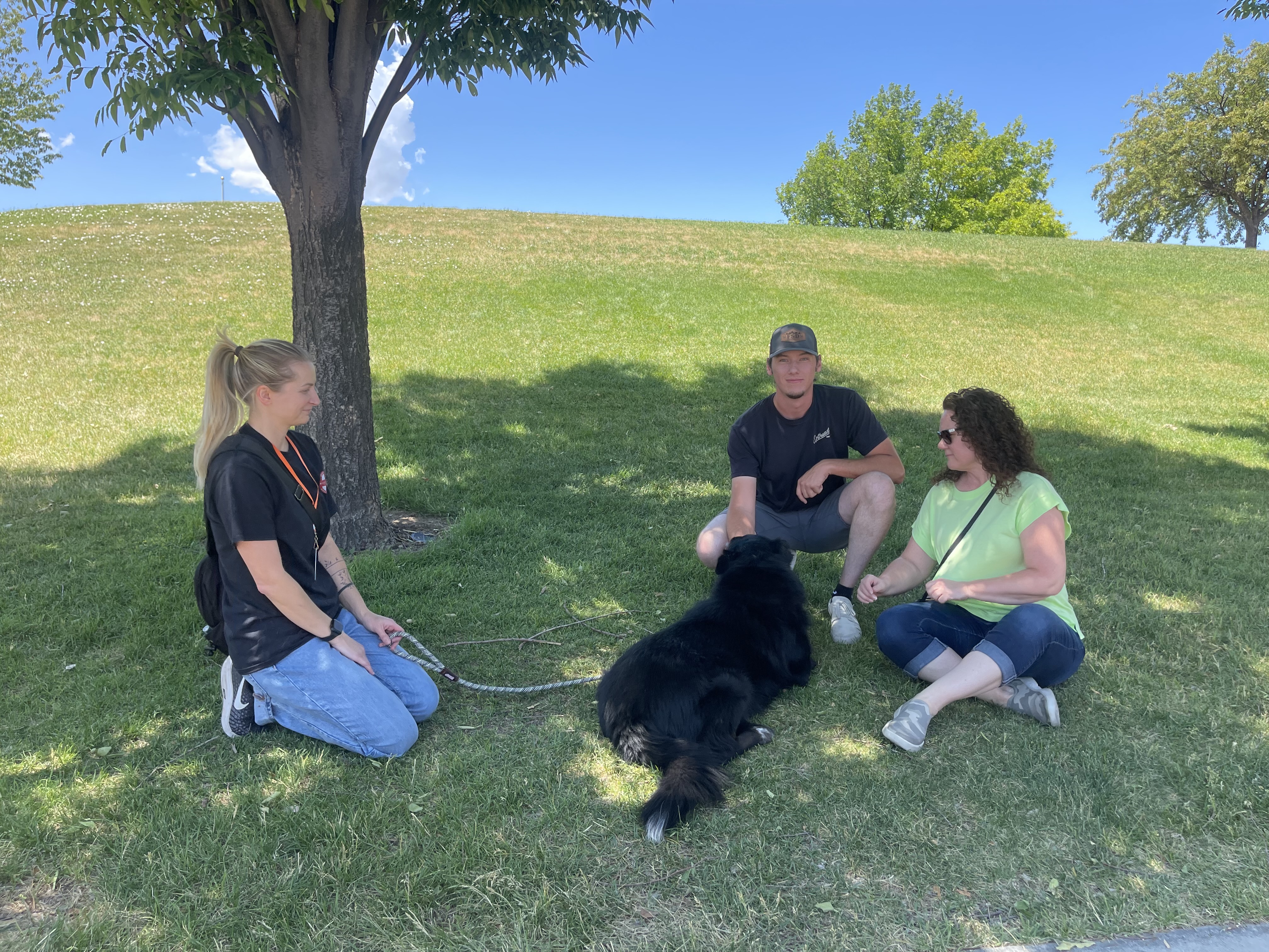 Krystal Arnett, left, helps introduce Jake and Jenni Varney to a dog. West Valley City Animal Services held a Shelter Saturday event, where people could come to adopt pets in need of a good home.