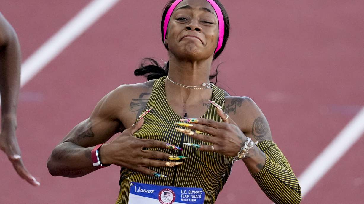 Sha'Carri Richardson celebrates her win in the wins women's 100-meter run final during the U.S. Track and Field Olympic Team Trials Saturday, June 22, 2024, in Eugene, Ore.