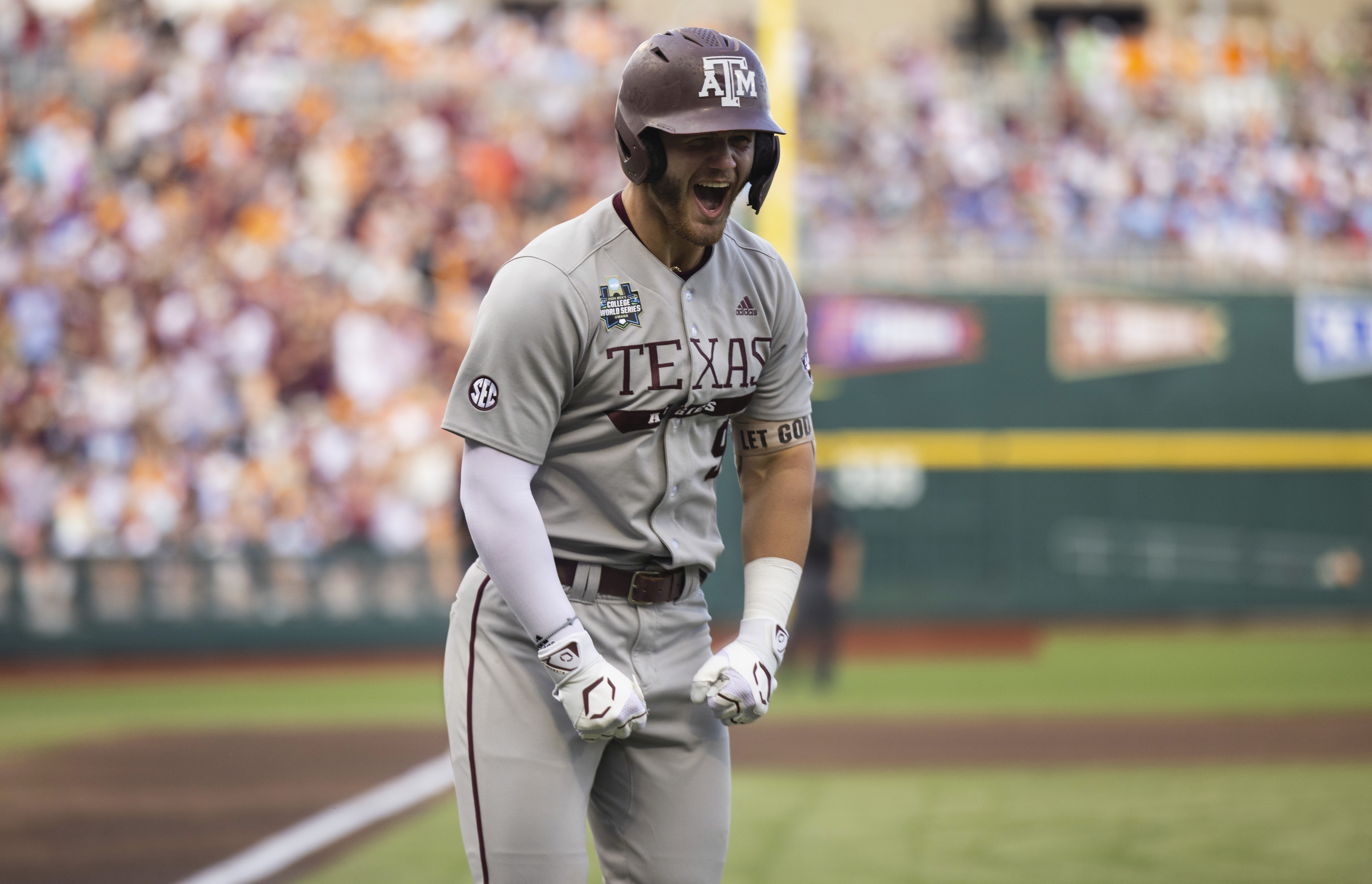 Texas A&M's Gavin Grahovac celebrates after hitting a solo home run against Tennessee during the first inning of Game 1 of the NCAA College World Series baseball finals in Omaha, Neb., Saturday, June 22, 2024. 