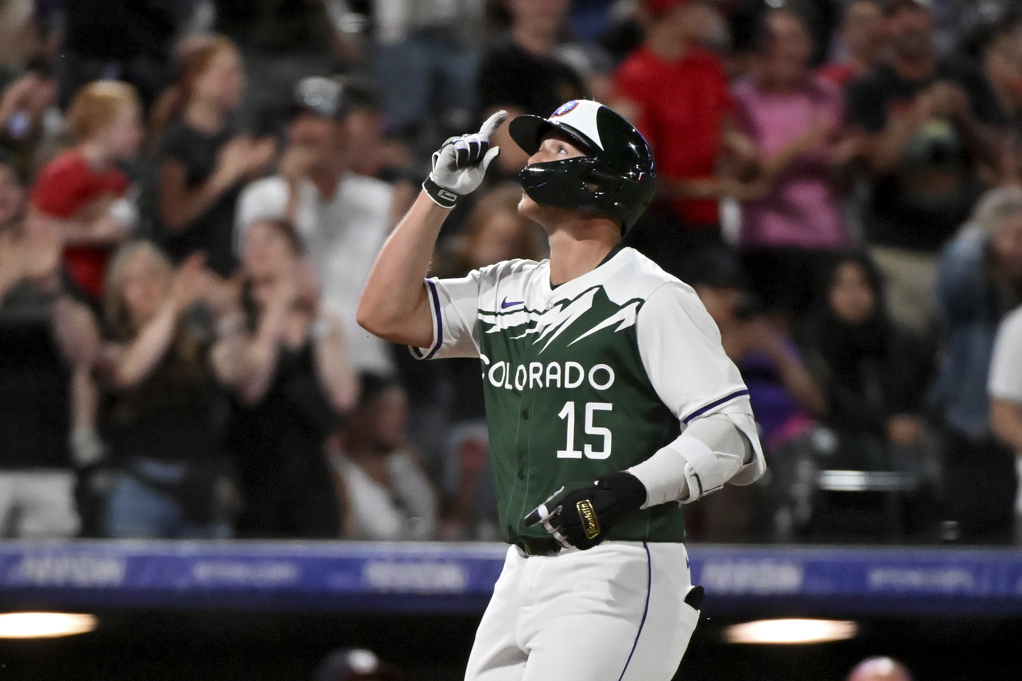 Colorado Rockies' Hunter Goodman celebrates his solo home run against the Washington Nationals during the seventh inning of a baseball game Saturday, June 22, 2024, in Denver. 