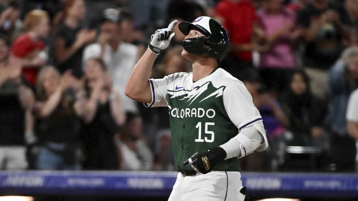 Colorado Rockies' Hunter Goodman celebrates his solo home run against the Washington Nationals during the seventh inning of a baseball game Saturday, June 22, 2024, in Denver.