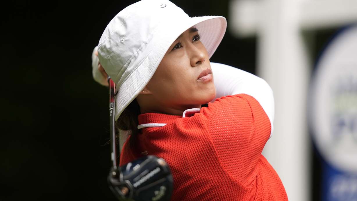 Amy Yang, of South Korea, watches her shot after hitting from the 16th tee during the final round of the Women's PGA Championship golf tournament at Sahalee Country Club, Sunday, June 23, 2024, in Sammamish, Wash.