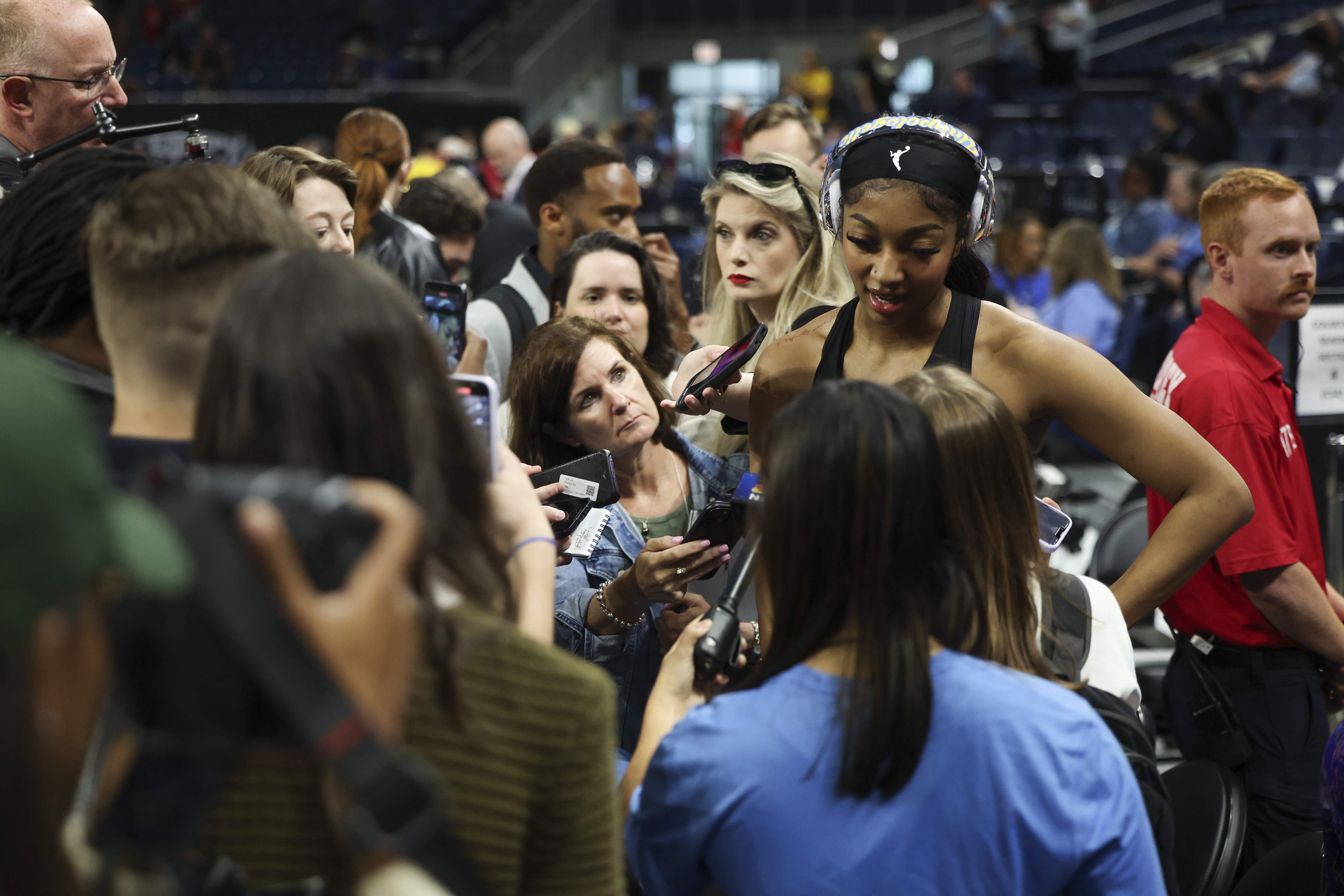 Chicago Sky forward Angel Reese answers questions before a WNBA basketball game against the Indiana Fever, Sunday, June 23, 2024, in Chicago.