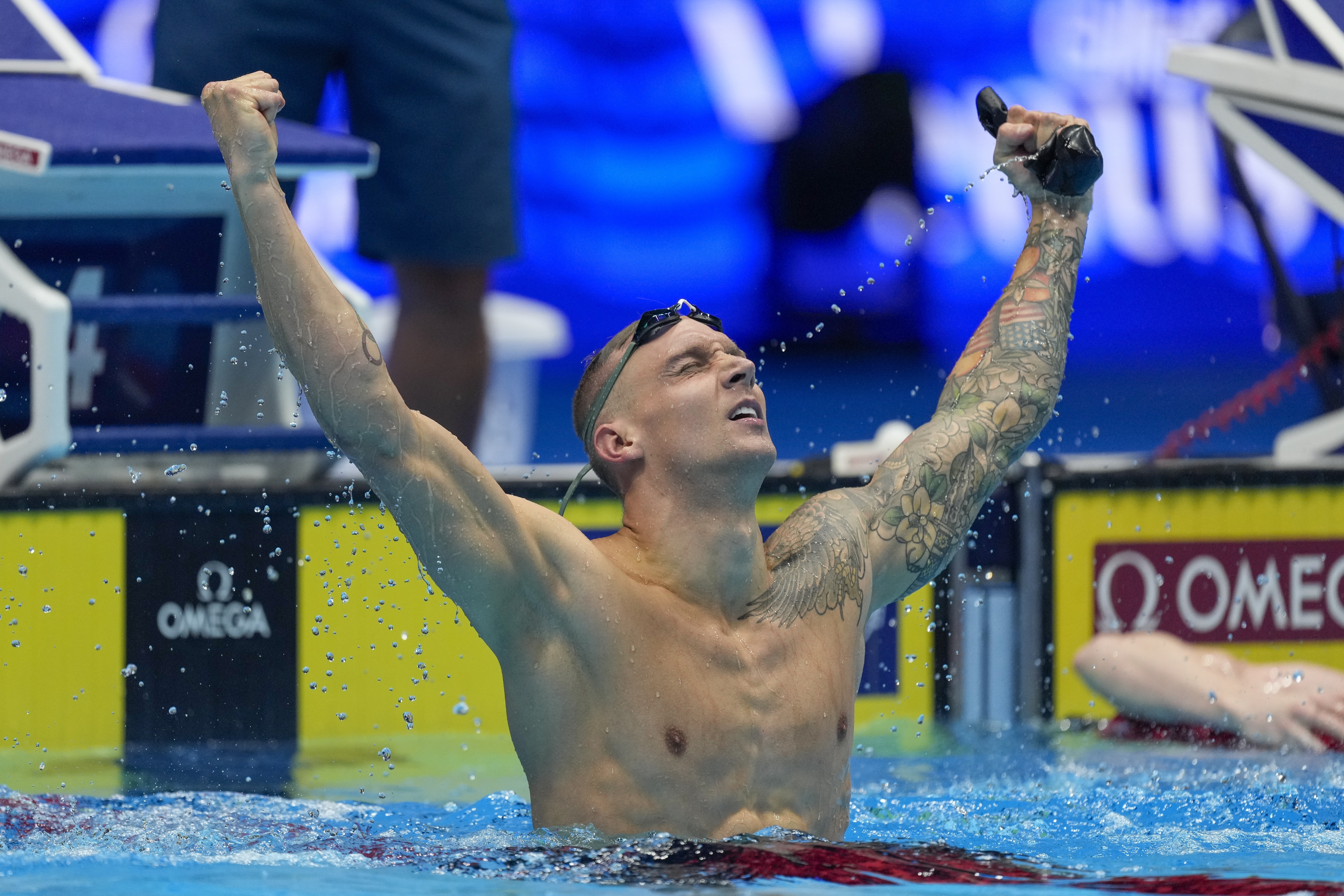 Caeleb Dressel reacts after winning the Men's 100 butterfly finals Saturday, June 22, 2024, at the US Swimming Olympic Trials in Indianapolis. 