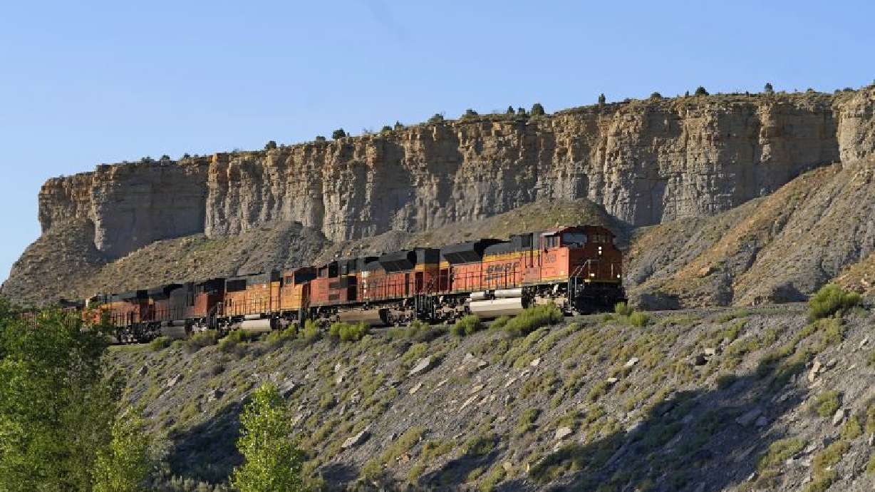A train transports freight on a common carrier line near Price, July 13, 2023. The Supreme Court has agreed to consider reviving a critical approval for a railroad project that would carry crude oil and boost fossil fuel production in rural eastern Utah.