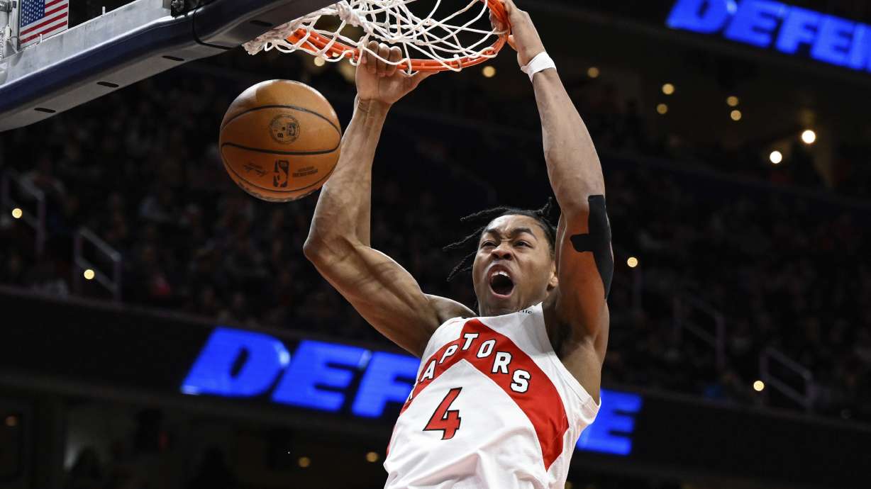 FILE - Toronto Raptors forward Scottie Barnes dunks during the second half of an NBA basketball game against the Washington Wizards, March. 4, 2023, in Washington. Barnes and the Raptors have agreed to terms on a max extension, one that will be worth about $225 million over five years and could reach about $270 million if he meets supermax criteria, a person with knowledge of the deal said Monday, June 24, 2024.