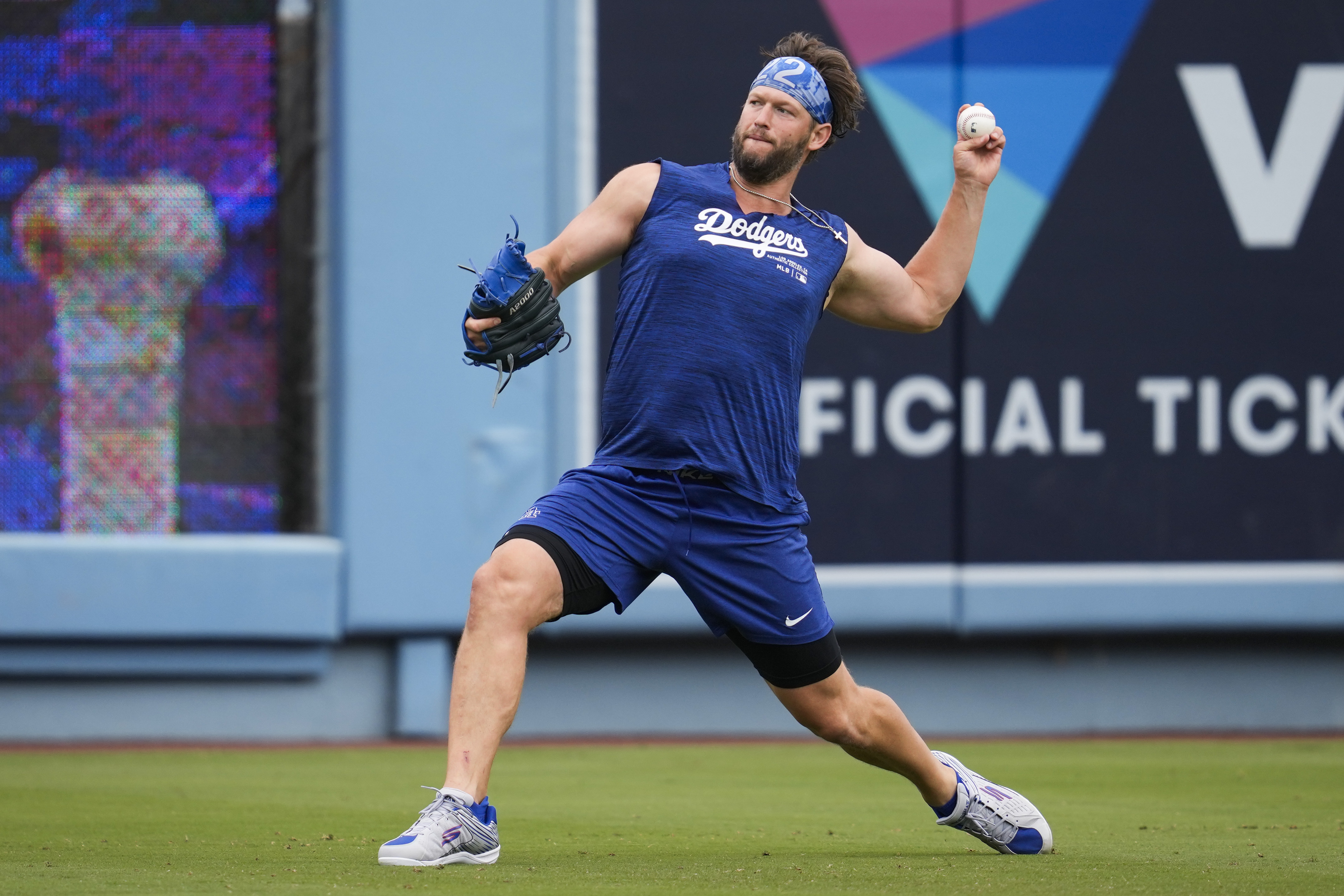 Los Angeles Dodgers' Clayton Kershaw works out before a baseball game against the Colorado Rockies in Los Angeles, Sunday, June 2, 2024. 