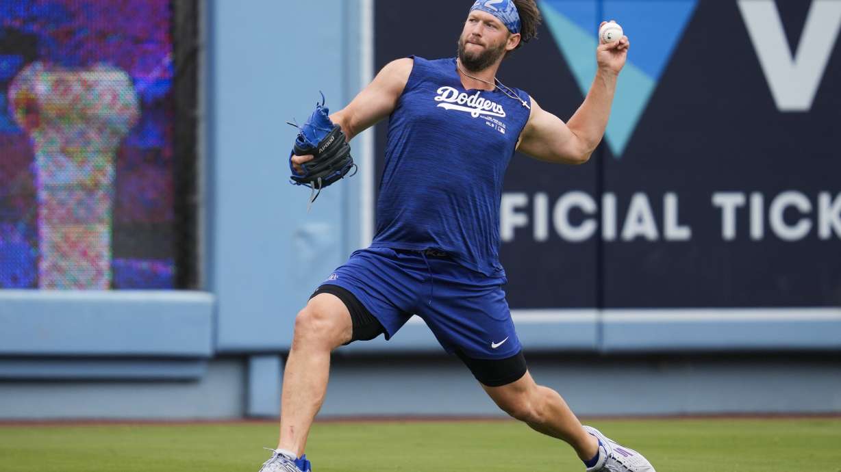 Los Angeles Dodgers' Clayton Kershaw works out before a baseball game against the Colorado Rockies in Los Angeles, Sunday, June 2, 2024.
