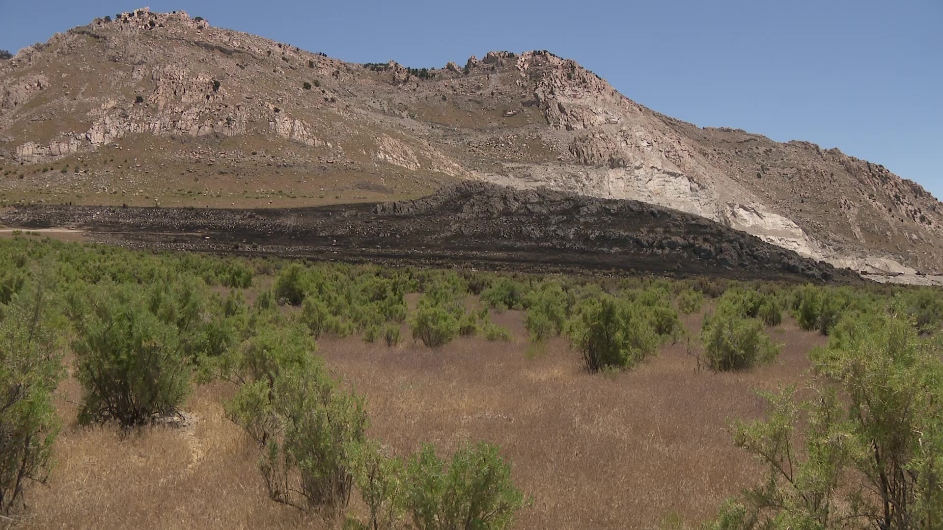 The burn scar is from one of the three fires that started in Tooele County in June 2024.