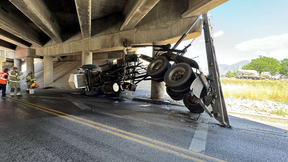 A semitruck hit the underside of an overpass while crossing underneath I-15 in Payson on Tuesday afternoon.