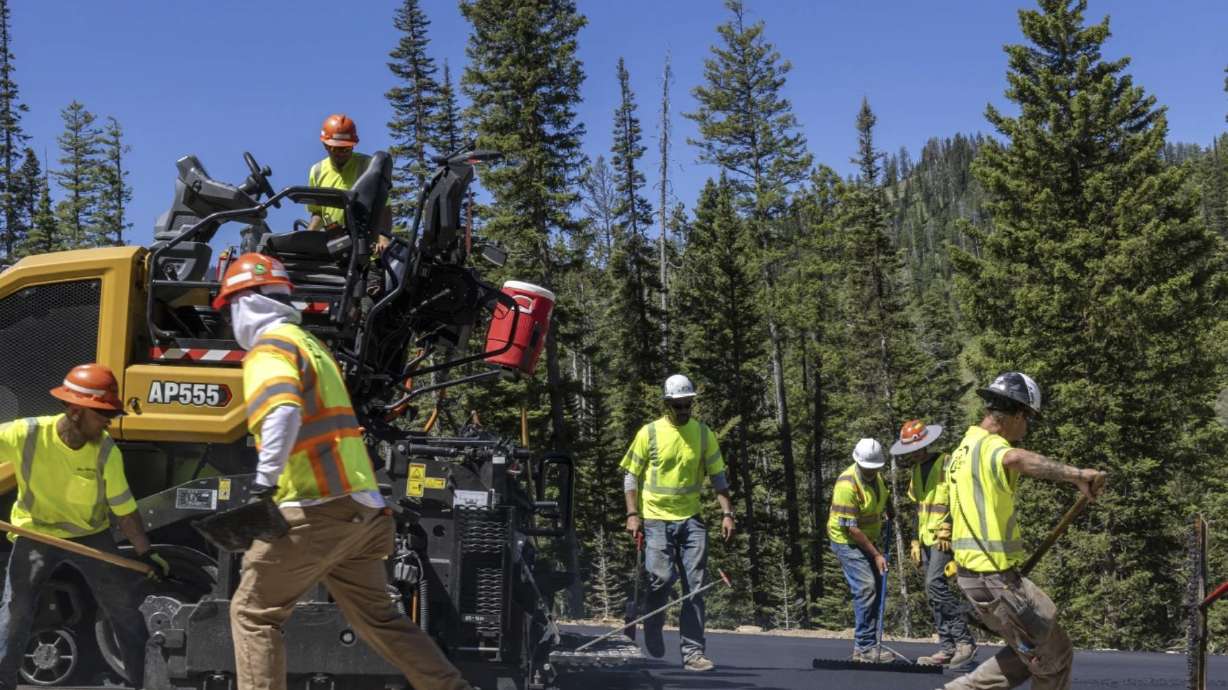 Construction take place on the Teton Pass on Tuesday near Jackson, Wyo. Wyoming officials are expected to reopen this week a large chunk of a mountain pass highway in Wyoming that collapsed earlier this month.