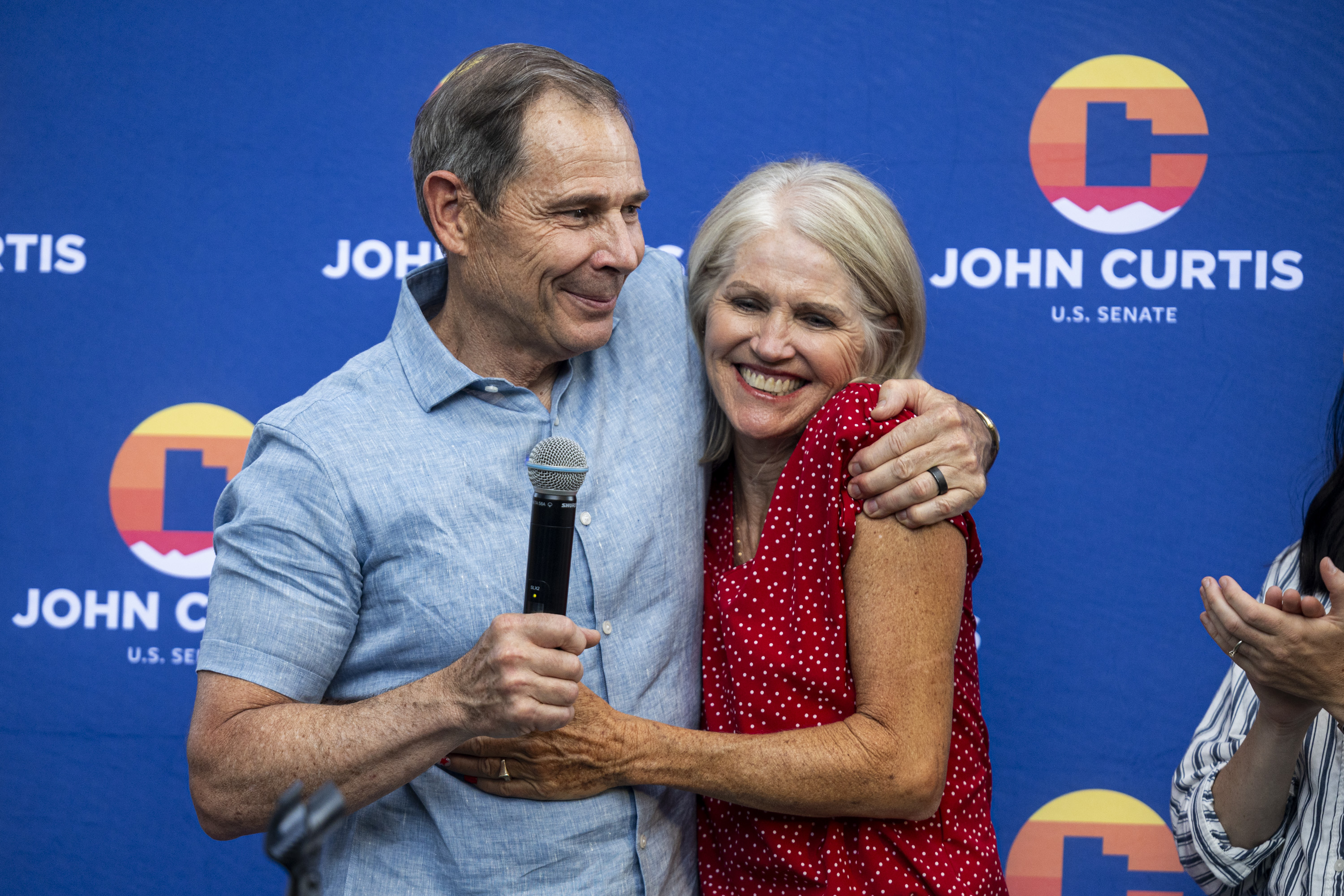 John Curtis hugs his wife, Sue Snarr, after giving a victory speech during a watch party for Curtis’ campaign held at Riverview Park in Provo on Tuesday. The Associated Press called Utah's U.S. Senate race for Curtis about 24 minutes after polls closed.