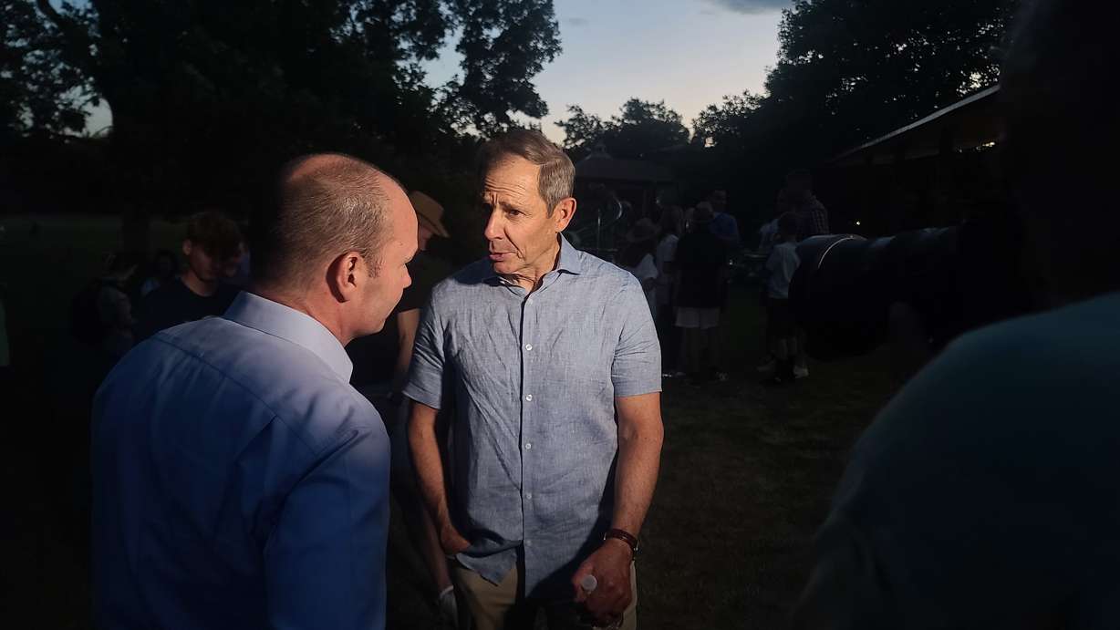 Sen. Mike Lee, left, speaks with Rep. John Curtis in Provo after the AP projected Curtis the winner of Utah's U.S. Senate race on Tuesday, June 25, 2024.