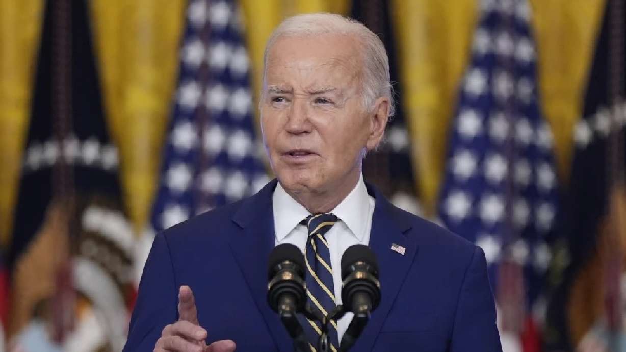 President Joe Biden speaks in the East Room at the White House in Washington, June 4. Biden is pardoning potentially thousands of former U.S. service members convicted of violating a now-repealed military ban.