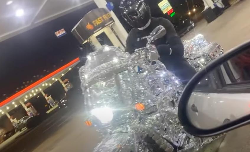 A sparkling motorcycle is spotted at a gas station in this June 9 video.