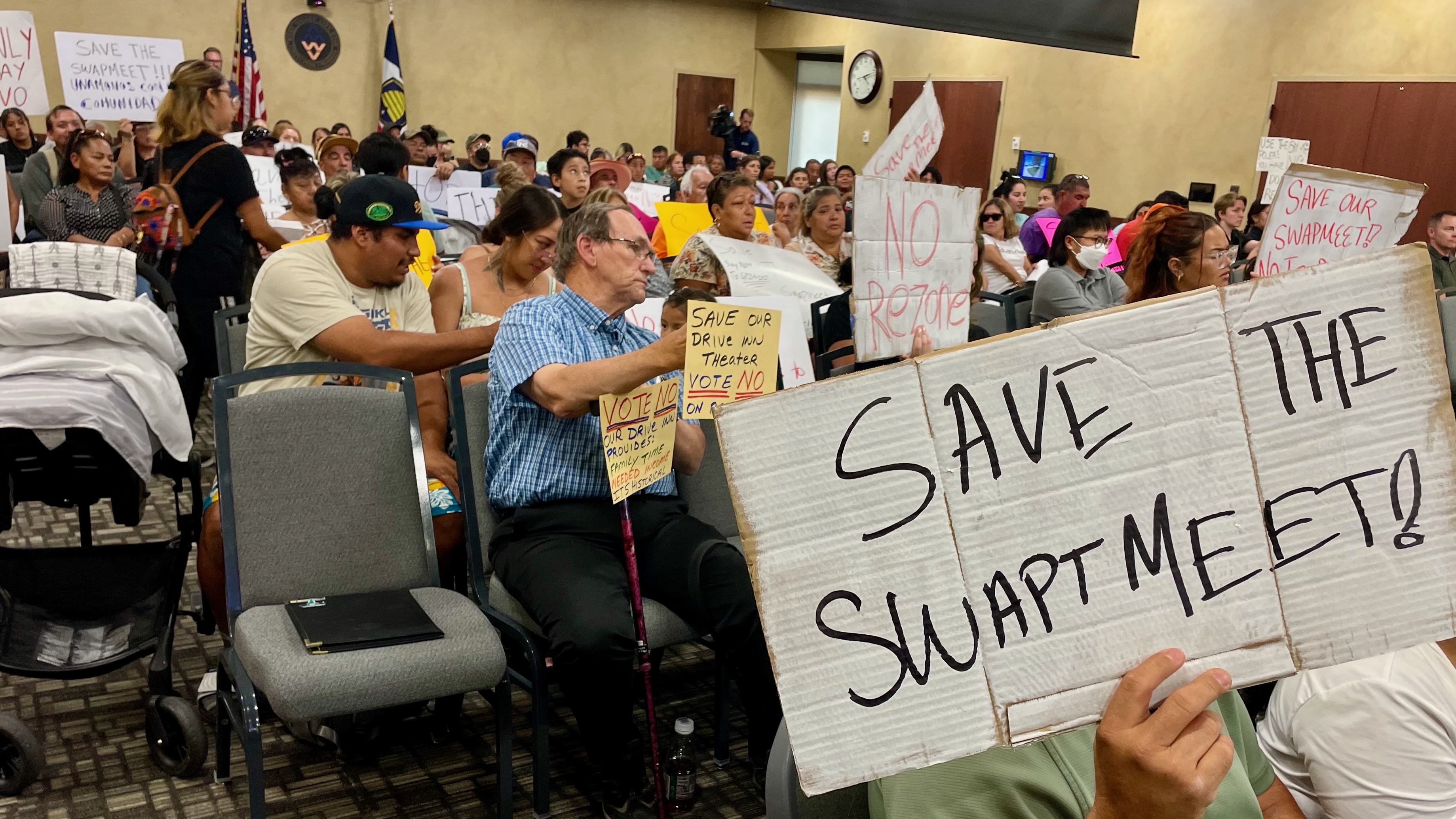 Foes of the proposed redevelopment of the Redwood Swap Meet site crowded into the West Valley City Planning Commission meeting on Wednesday.
