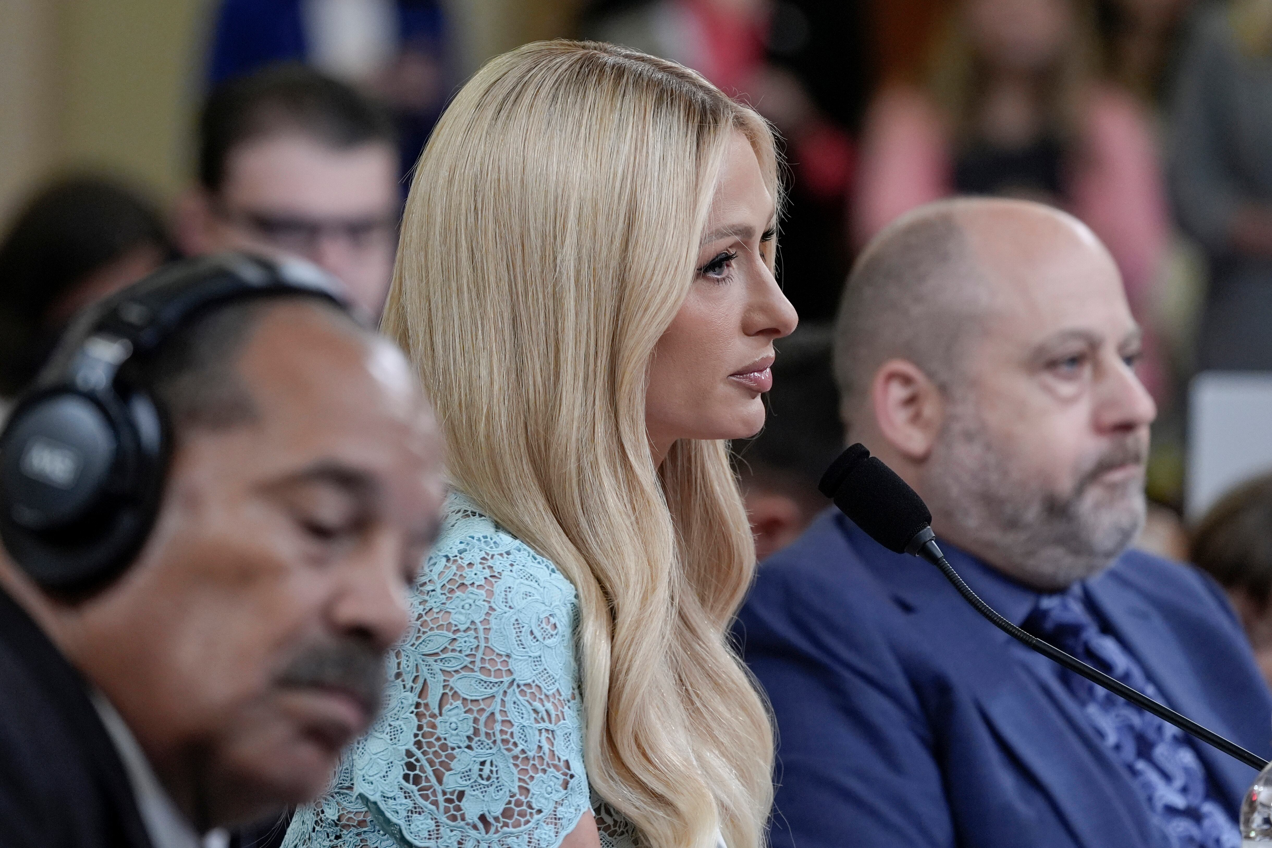 Paris Hilton, center, testifies during a House Committee on Ways and Means hearing on Strengthening Child Welfare and Protecting America's Children on Capitol Hill, Wednesday in Washington.