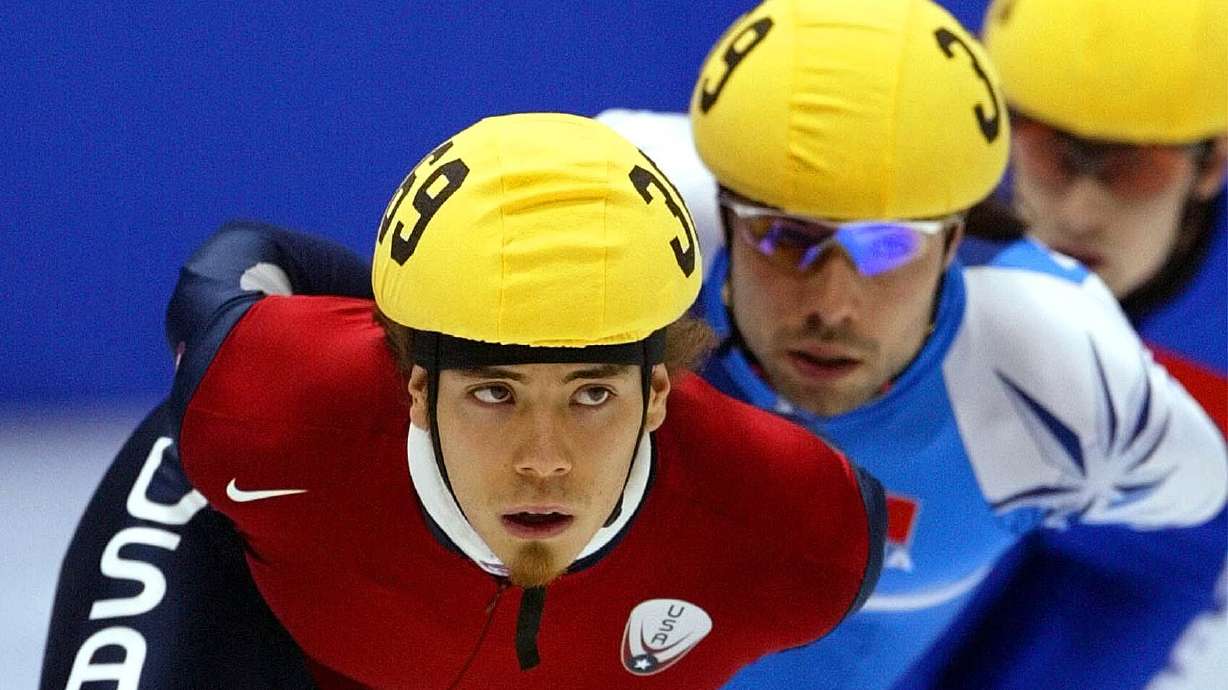 Apolo Ohno races during a 1500m Short Track heat, Feb. 20, 2002, at the Salt Lake Ice Center. Ohno, the most decorated U.S. Winter Olympian, was a keynote speaker of a summit on stigma surrounding mental illness and substance use disorders.