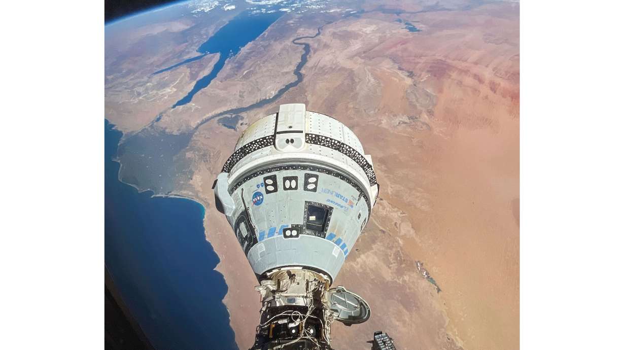 This photo provided by NASA shows the Starliner spacecraft docked to the Harmony module of the International Space Station, orbiting 262 miles above Egypt's Mediterranean coast, on June 13. NASA representatives said the capsule and its two-person crew are weeks away from returning to Earth.