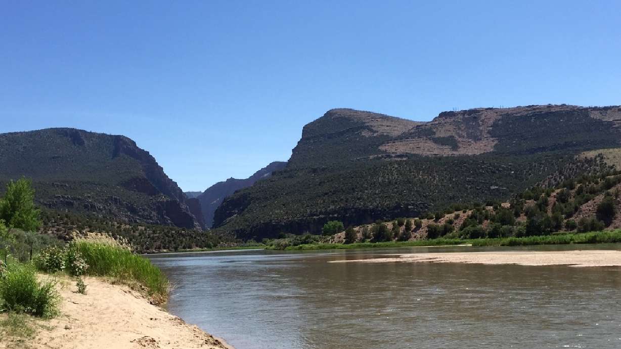 Water flows along the Green River near the Gates of Lodore on the Colorado side of Dinosaur National Monument in 2017. Park officials say a Utah man died in a rafting accident at the park Thursday.
