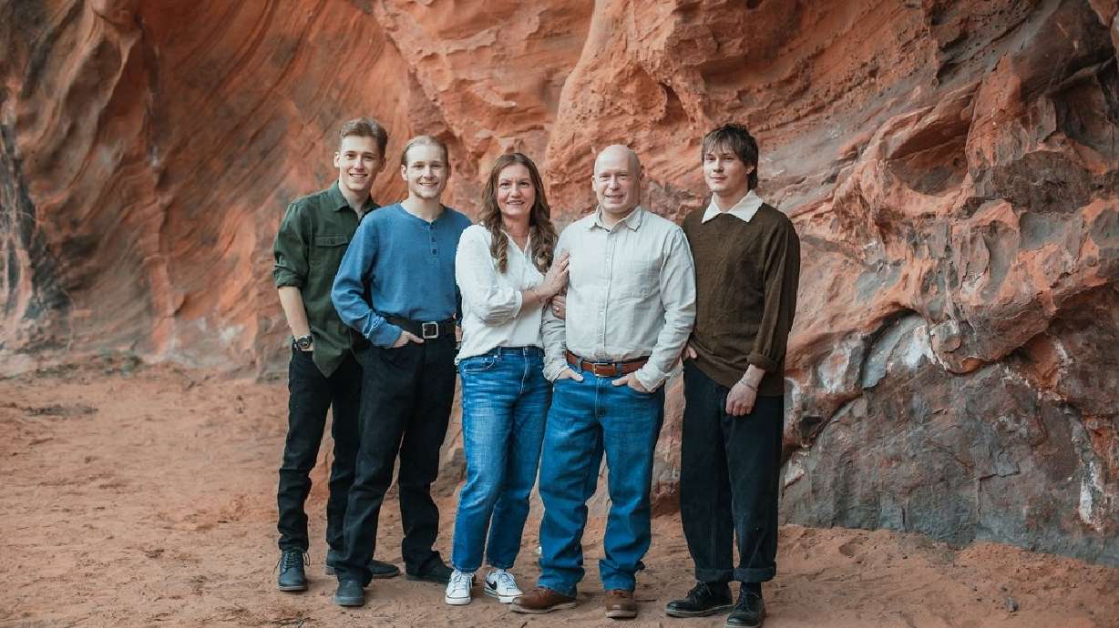 Brian and Marilee Laney pose with their three sons. Brian Laney has been diagnosed with cancer — 30 years after donating bone marrow to his older brother, Michael Laney.