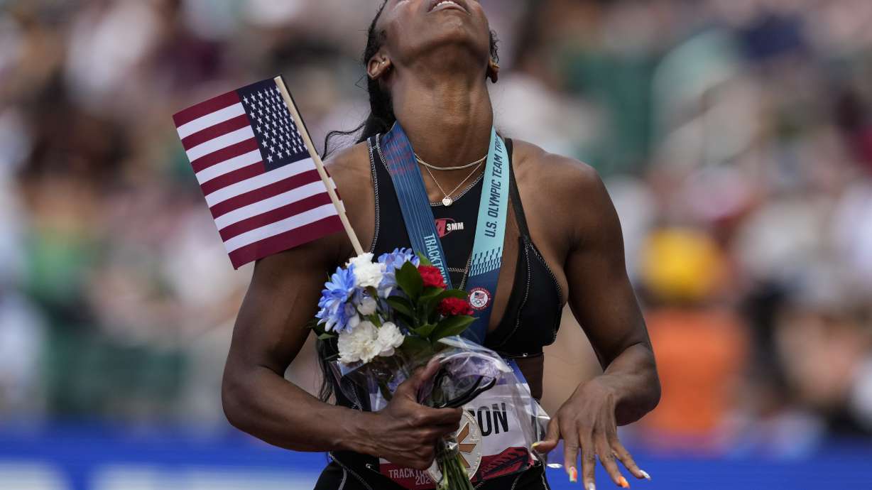 Alaysha Johnson reacts to a second place during the women's 100-meter hurdles final during the U.S. Track and Field Olympic Team Trials, Sunday, June 30, 2024, in Eugene, Ore.